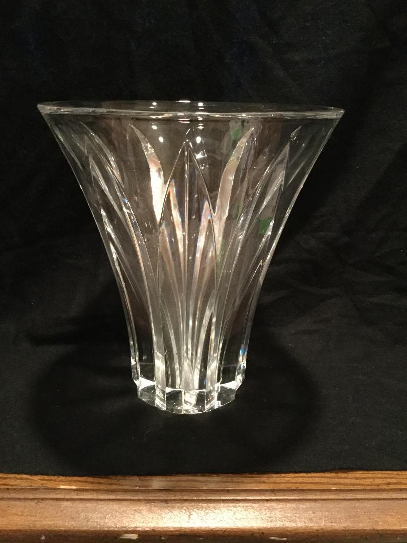 Beautiful lead crystal Baccarat vase in the Brigitte pattern designed in the 1960's by Nicolas Triboulet after Brigitte Bardot. This vase was introduced in the 1970s. The pattern was retired by the company in 1982. A truly visually stunning vase