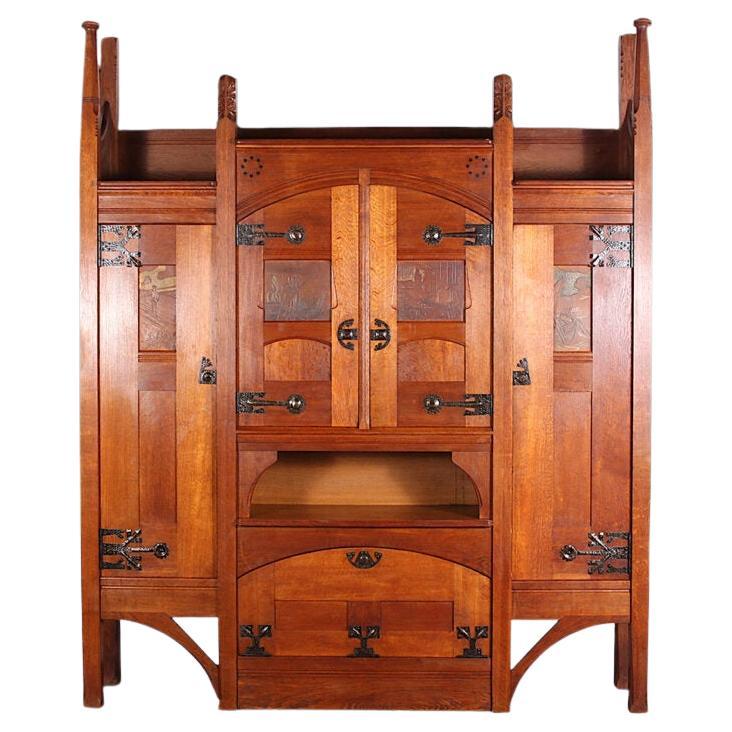 French Henri Rapin Arts and Crafts Bookcase in Oak For Sale