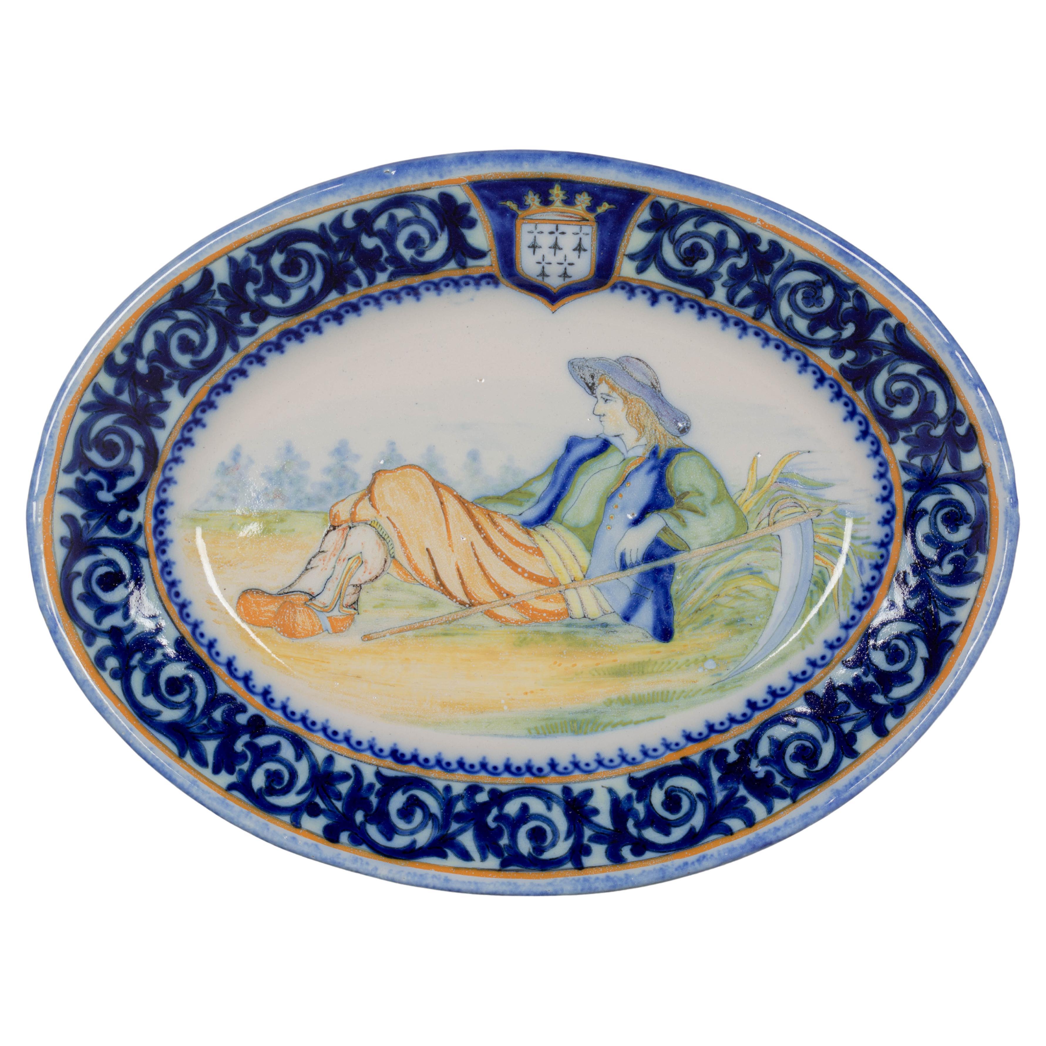 Piatto di maiolica francese Henriot Quimper