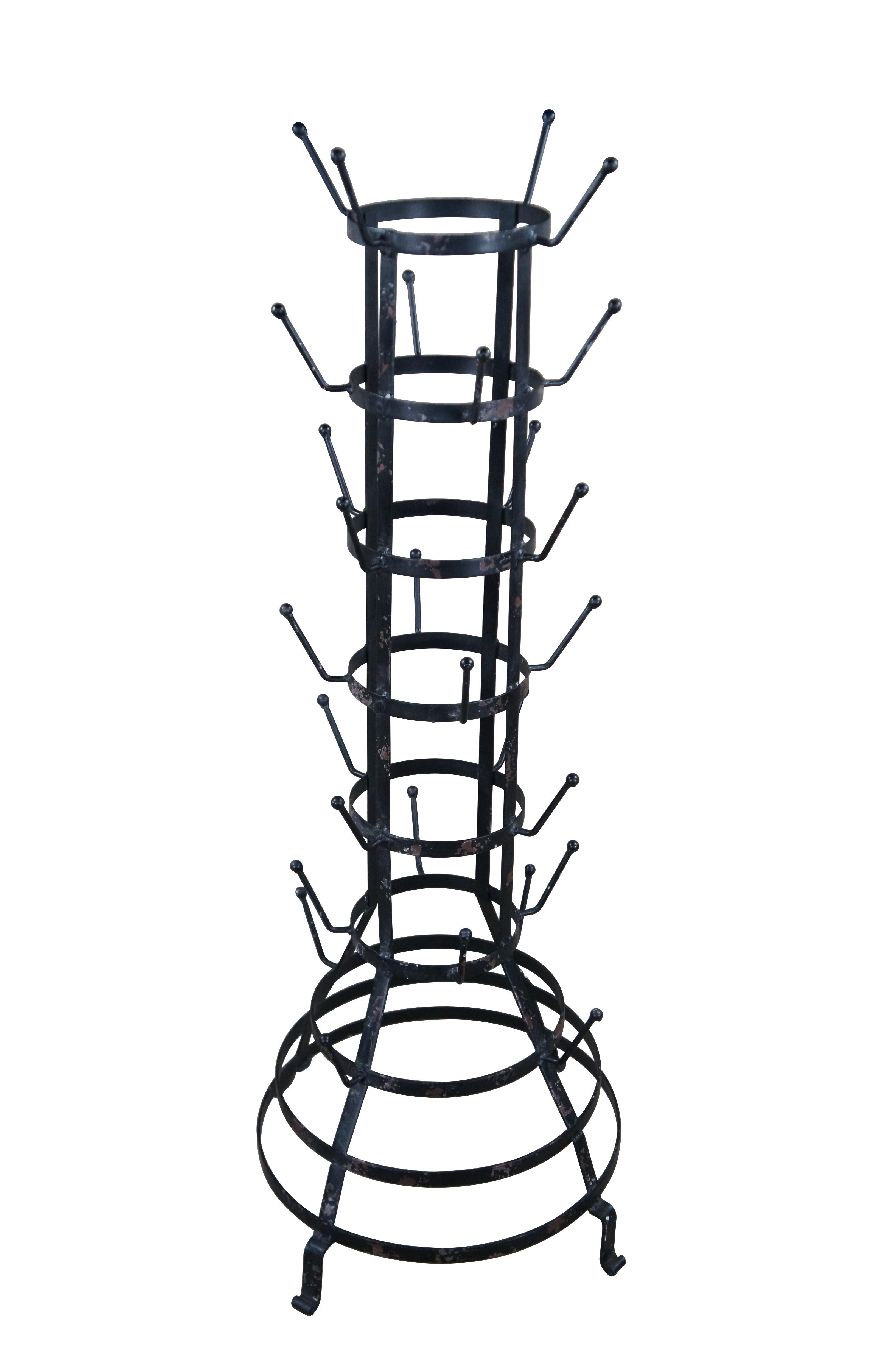 Mid century French Herisson industrial reclaimed bottle / mug drying rack.  Made of iron featuring 28 prongs or hooks for hanging.  These were also called a 