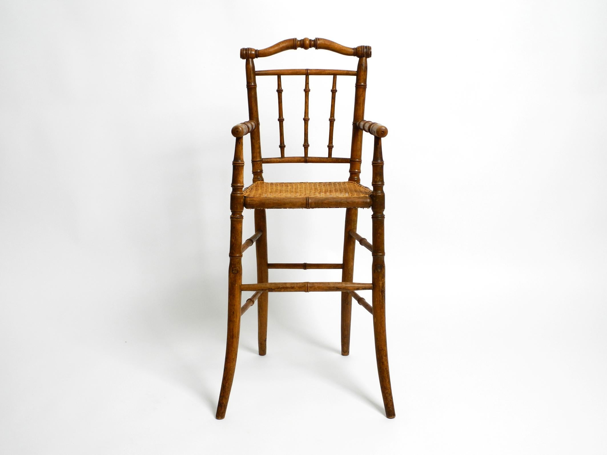French Highchair for a Child from the 30s Made of Bentwood with Viennese Wicker  In Good Condition For Sale In München, DE