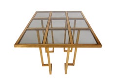 French Hollywood Regency Brass and Glass Grid Dining Table after Mastercraft