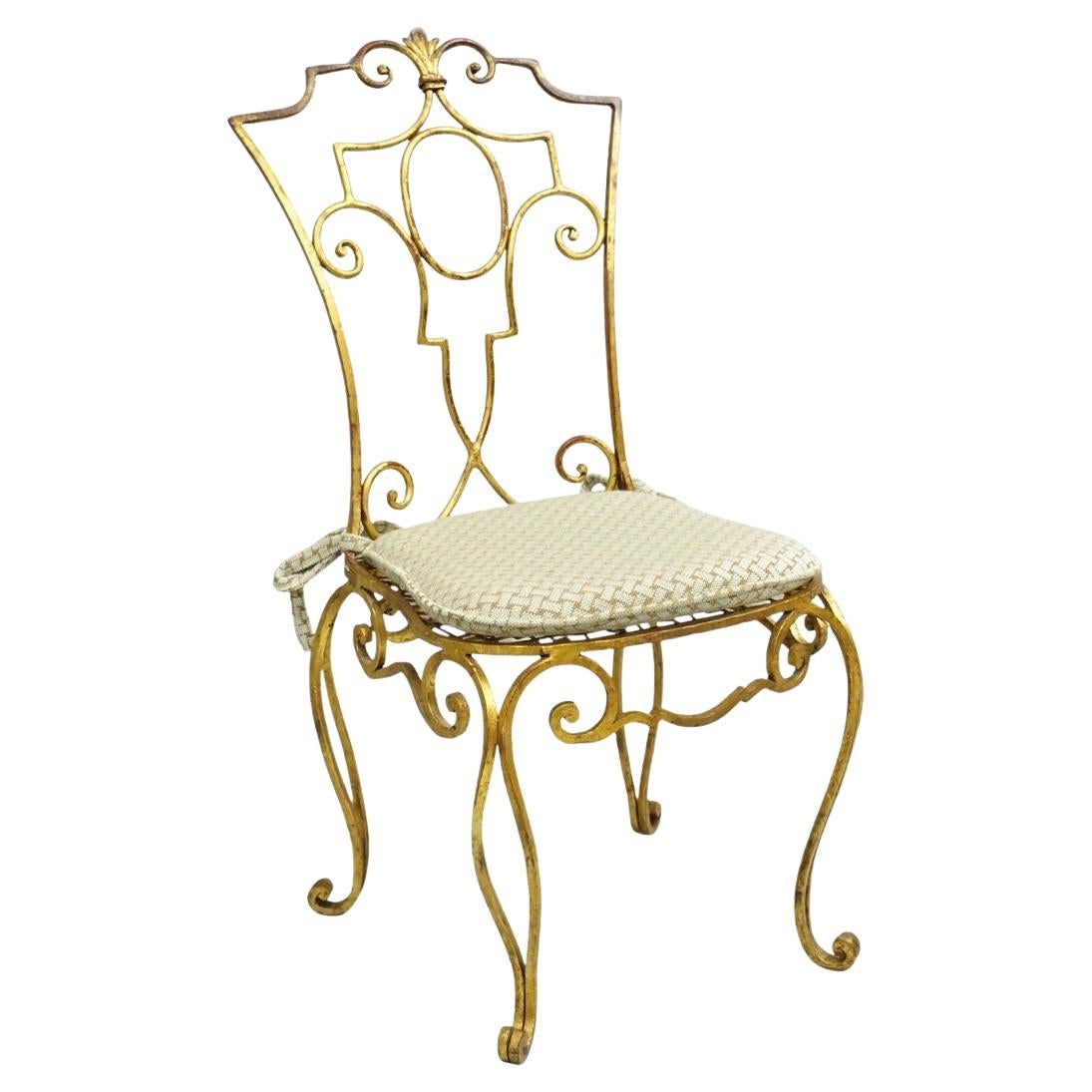 Silla auxiliar francesa estilo Hollywood Regency de hierro dorado Jean-Charles Moreux