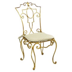 Silla auxiliar francesa estilo Hollywood Regency de hierro dorado Jean-Charles Moreux