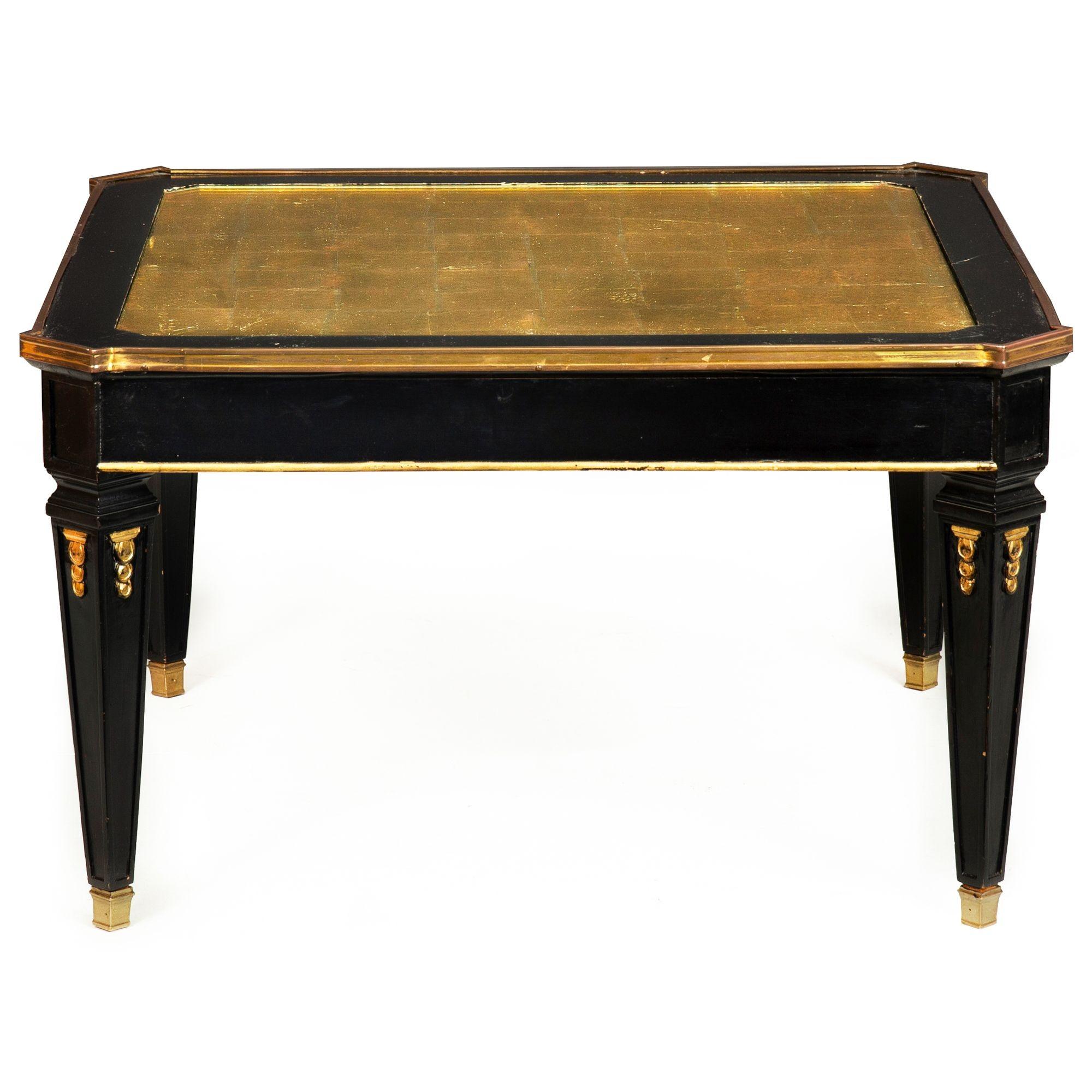 TABLE D'APPOINT HOLLYWOOD REGENCY ÉBONISÉE
Maison Jansen, sans marque, vers les années 1970

18