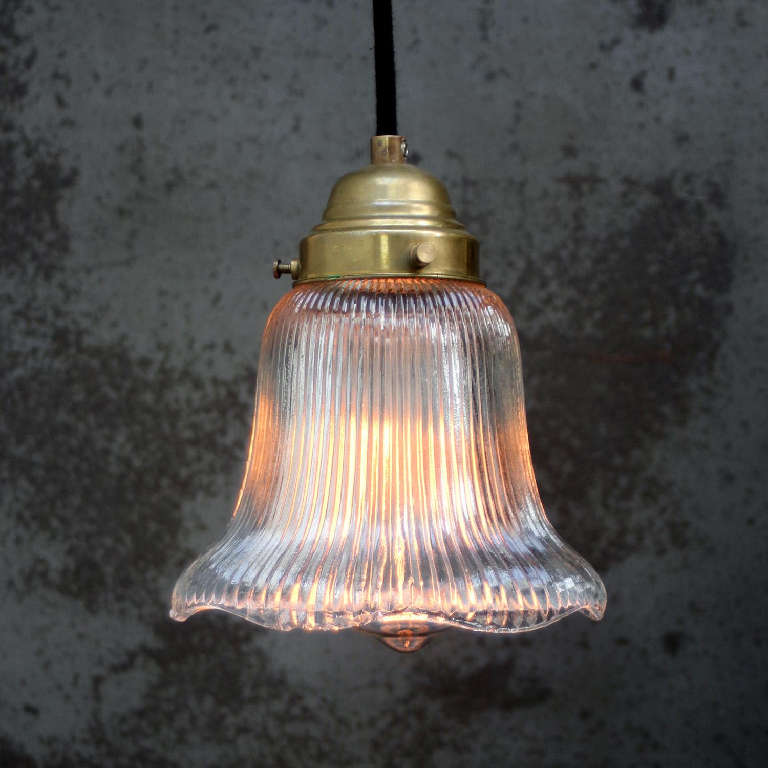Vintage Brass and glass pendant by Holophane, France
Brass top with pressed glass shade

Weight: 1.00 kg / 2.2 lb

Priced per individual item. All lamps have been made suitable by international standards for incandescent light bulbs,