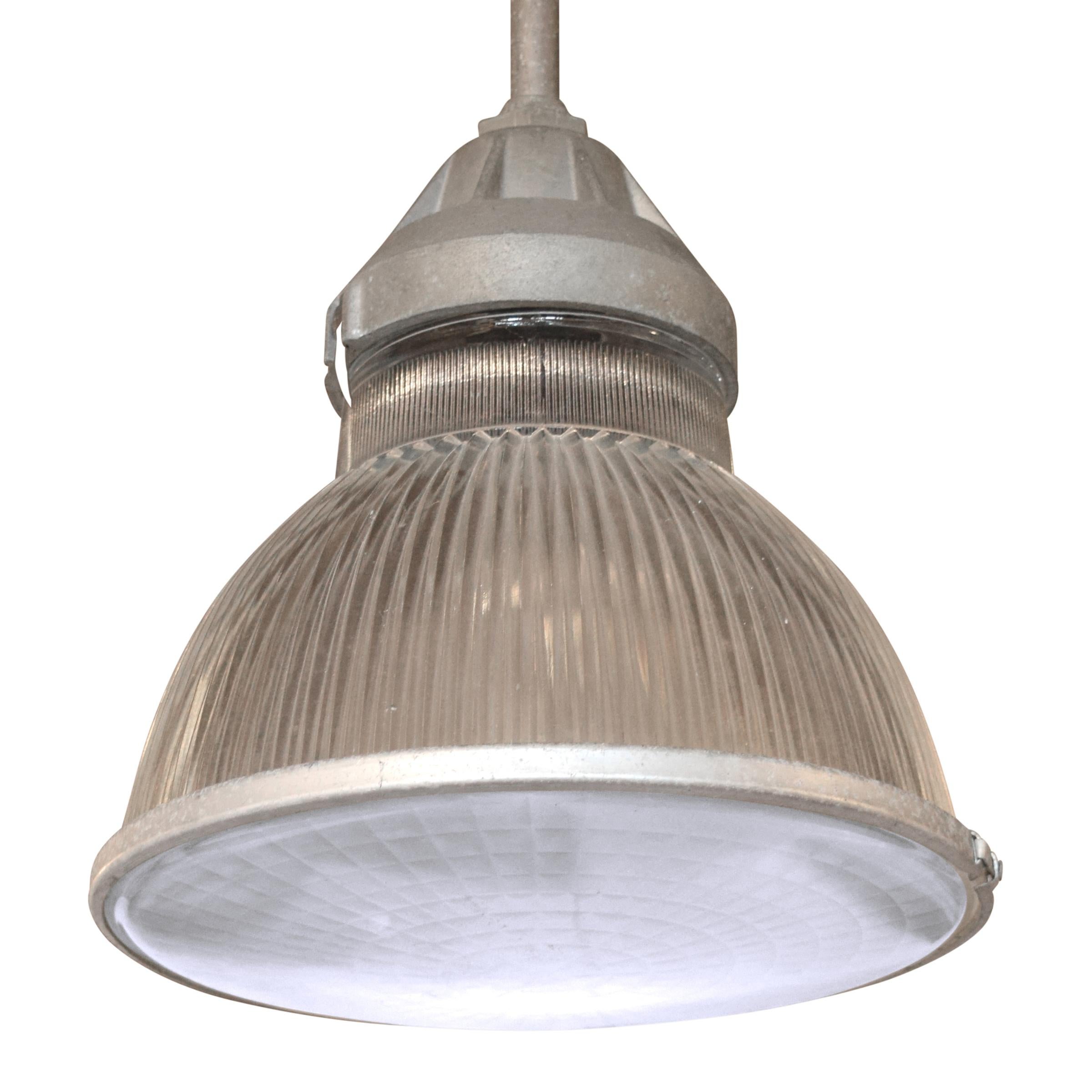 Early 20th century French holophane pendant light with an aluminium body. Multiple available.
