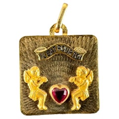 French Il Bat Pour Toi Mi corazón late por ti Colgante de amor de oro amarillo de 18 quilates con rubí