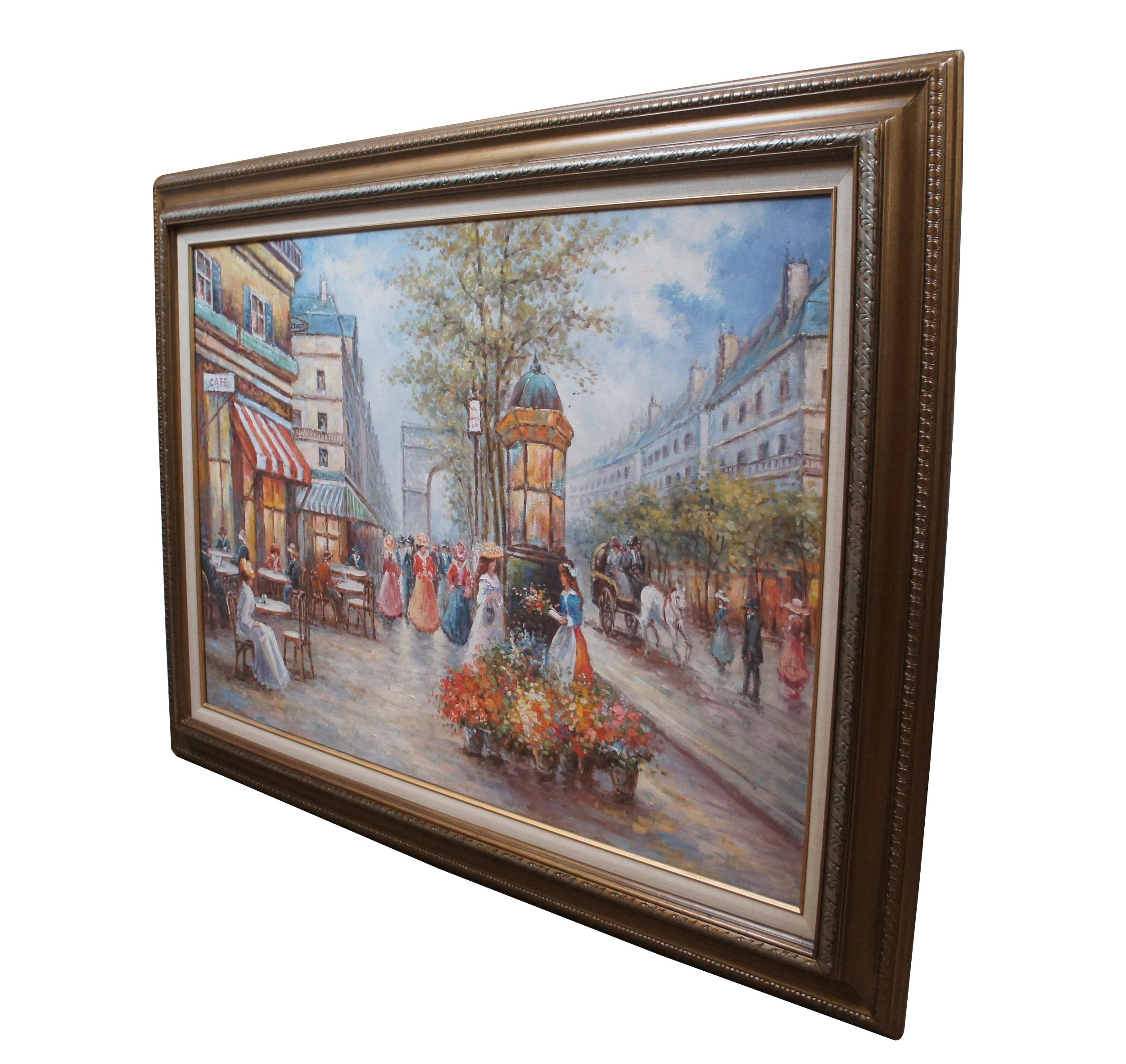 Vintage oil on canvas impressionist painting showing a cityscape / street scene of a cafe lined street in Paris, viewing the Arc de Triomphe filled with figures in Victorian dress. Gilded beveled frame with simple carved details, white linen mat and