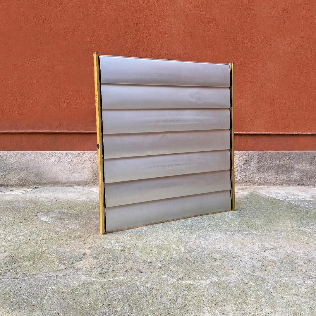 French industrial brise-soleil aluminium panel by Jean Prouvè, 1956.
Aluminum panel or brise-soleil, coming from the facade of the Beziers school, in France.
The structure is made up of an aluminum frame with a golden finish that supports seven