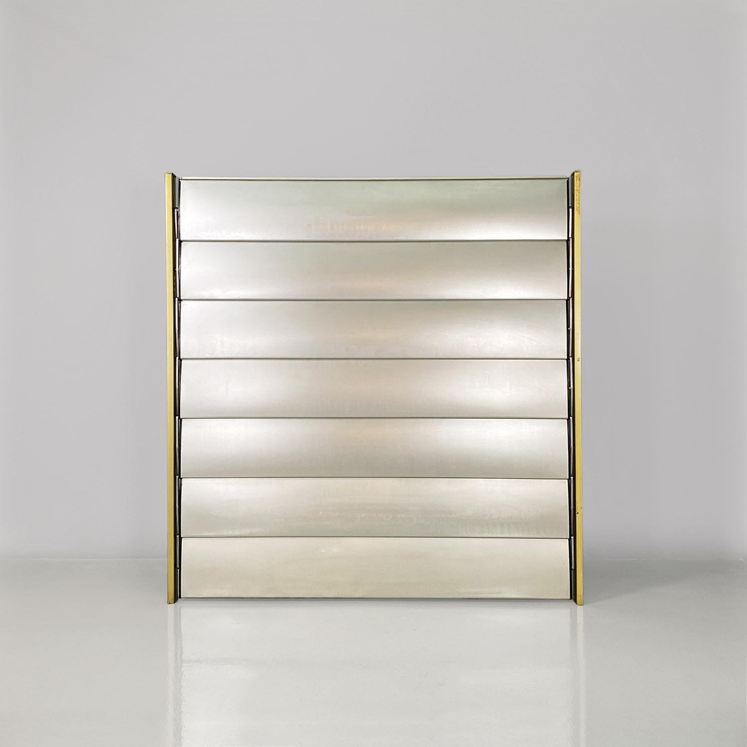  French industrial brise-soleil aluminium panel by Jean Prouvè, 1956.
Aluminum panel or brise-soleil, from the facade of the school in Beziers, France.
The structure is composed of an aluminum frame with a golden finish which supports seven sunshade