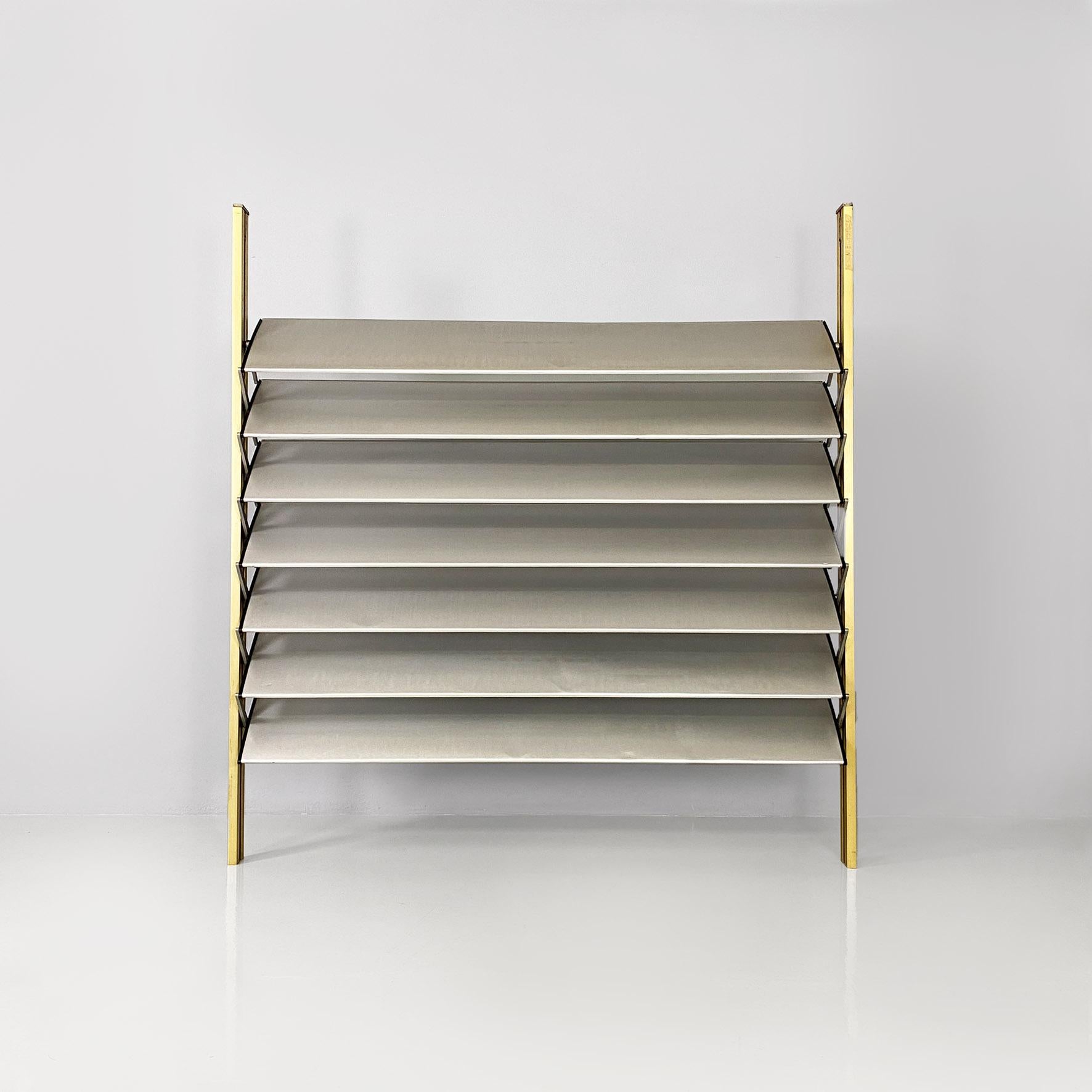  French industrial brise-soleil aluminium panel by Jean Prouvè, 1956.
Aluminum panel or brise-soleil, from the facade of the school in Beziers, France.
The structure is composed of an aluminum frame with a golden finish which supports seven sunshade