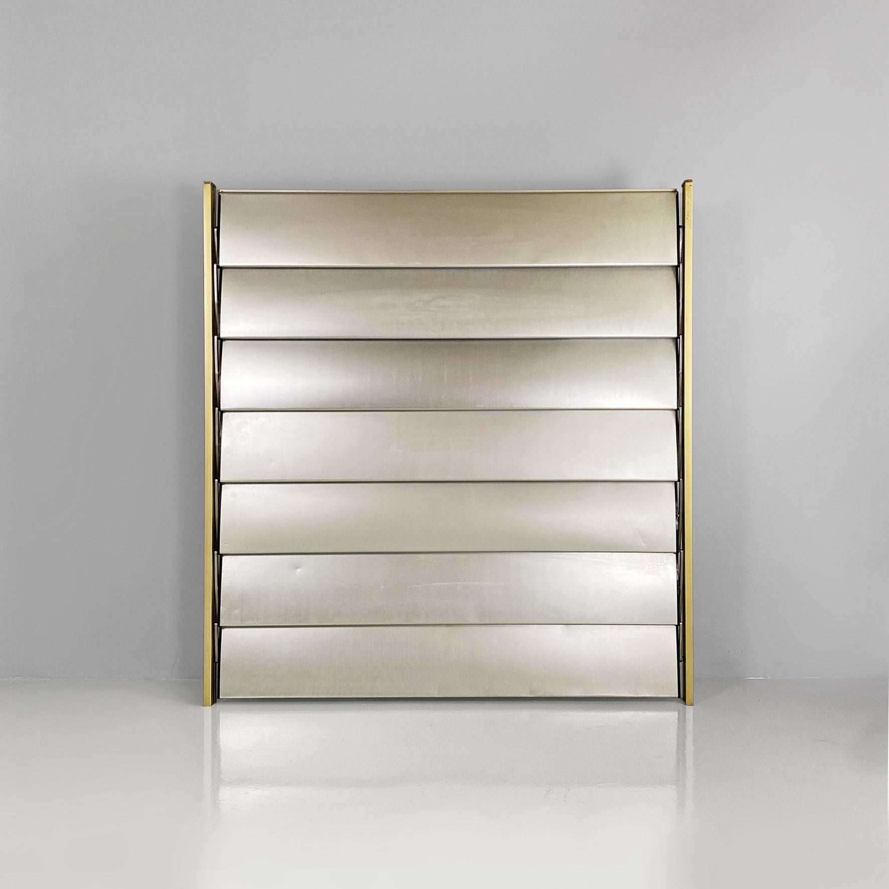  French industrial brise-soleil aluminium panel by Jean Prouvè, 1956.
Aluminum panel or brise-soleil, from the facade of the school in Beziers, France.
The structure is composed of an aluminum frame with a golden finish which supports seven sunshade