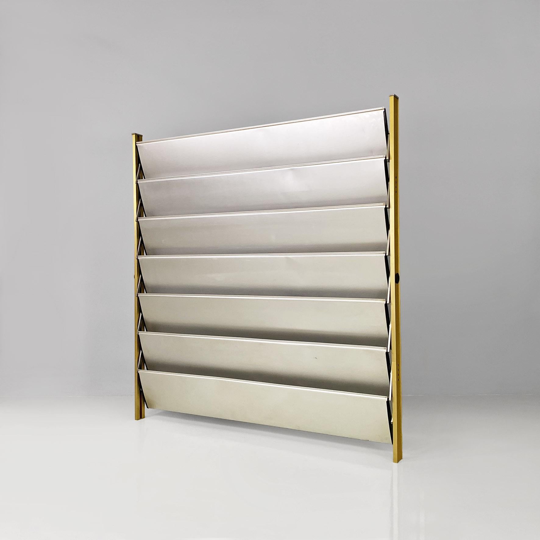  French industrial brise-soleil aluminium panel by Jean Prouvè, 1956.
Aluminum panel or brise-soleil, from the facade of the school in Beziers, France.
The structure is composed of an aluminum frame with a golden finish which supports seven sunshade