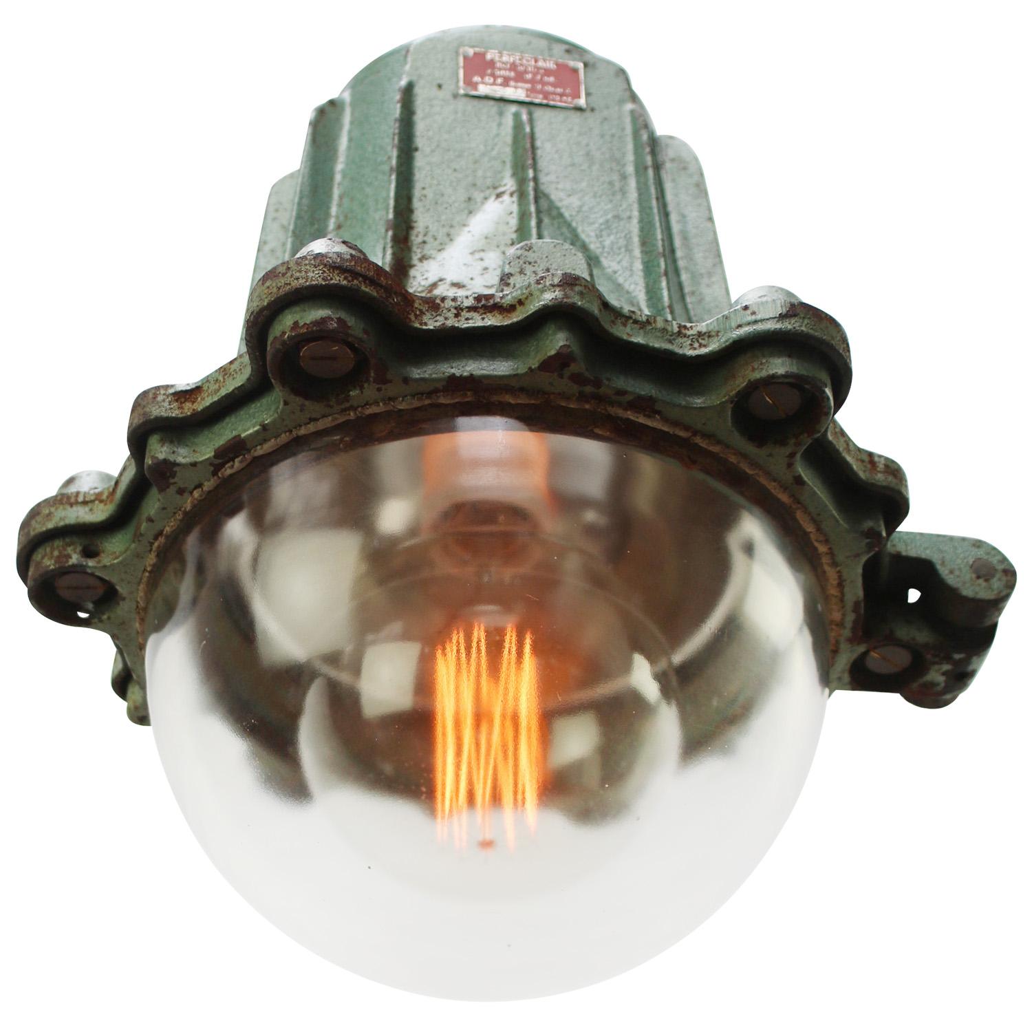 French factory pendant from 1967 by Perfeclair, France
Green cast iron
Clear glass with cage

Heavy metal!!!

Weight: 15.60 kg / 34.4 lb

Priced per individual item. All lamps have been made suitable by international standards for incandescent light