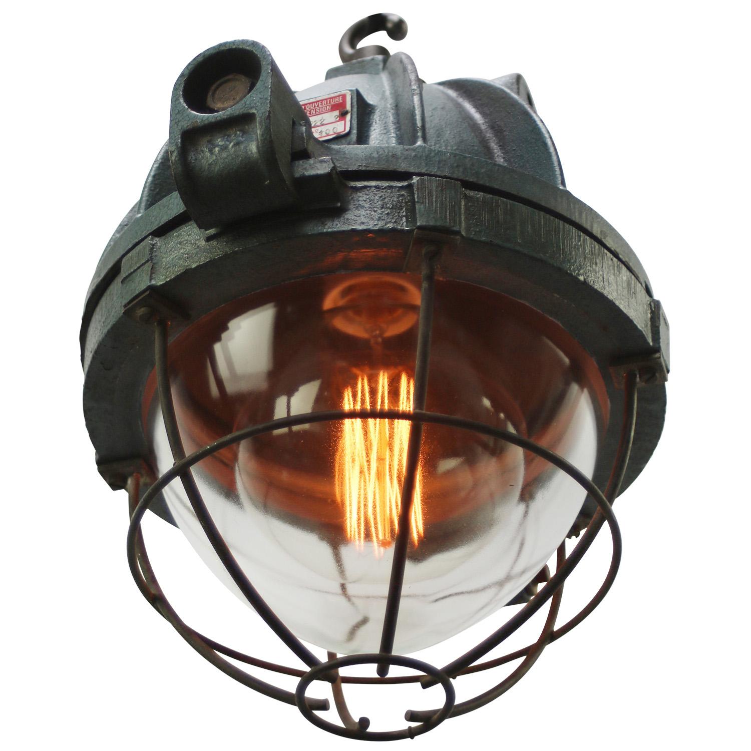 French factory pendant from 1967 by EEA, France
Green cast iron
Clear glass with cage

Heavy metal!!!

Weight: 14.60 kg / 32.2 lb

Priced per individual item. All lamps have been made suitable by international standards for incandescent light bulbs,