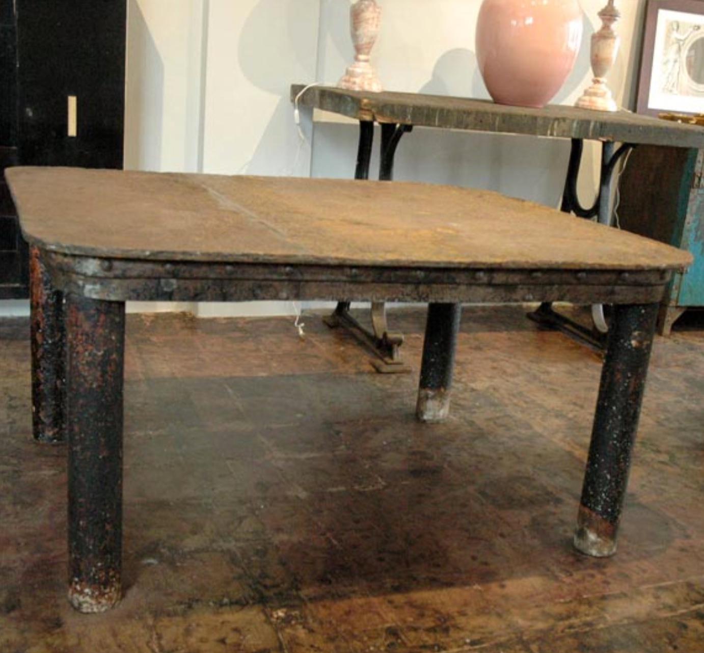 Amazing early 20th century solid patinated French industrial workshop table.

Beautiful aged / weathered / rough surface. Heavy solid oxidized steel. Soldered and riveted. 3/4 inch thick top.

Great as a desk with a large leather sous-main.