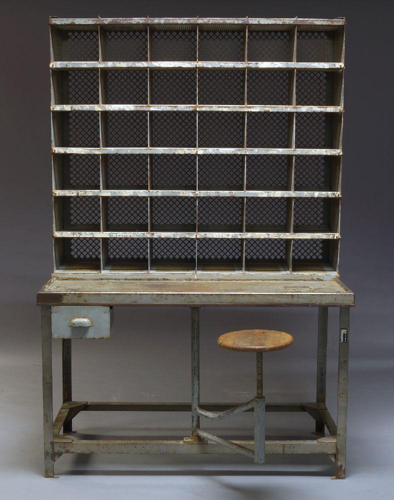 French industrial postal sorting desk, circa 1920

Magnificent French industrial steel postal desk work station, produced by Régie Industrielle des Establishments Pénitentiaire de Melun, (Industrial Board of Penitentiary Establishments of Melun),