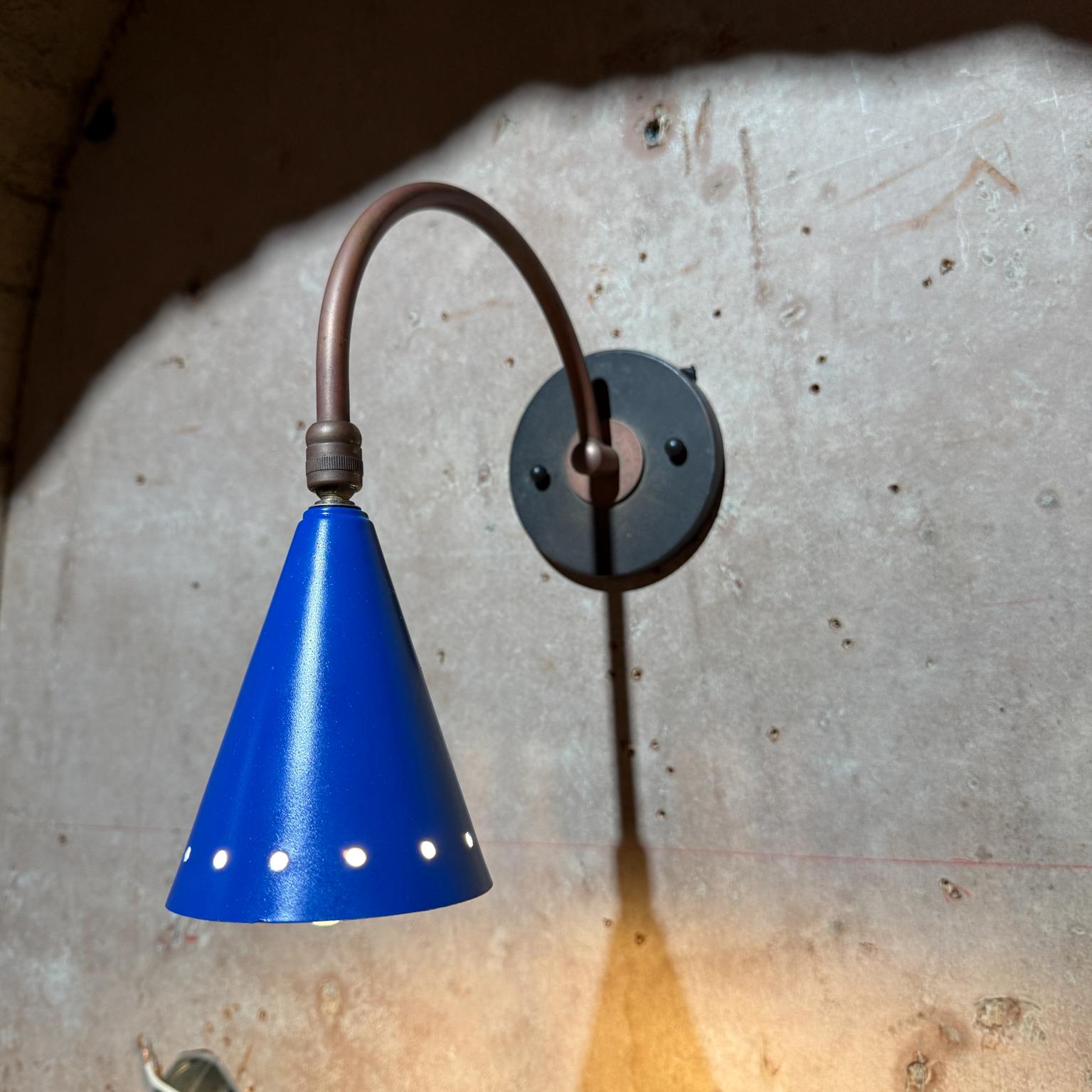 For your consideration, an Industrial Wall Sconce After Jacques Biny. Made in France circa the the 1950s. ( Jean Prouve Era). Retrofitted to meet US standards  4 1/2