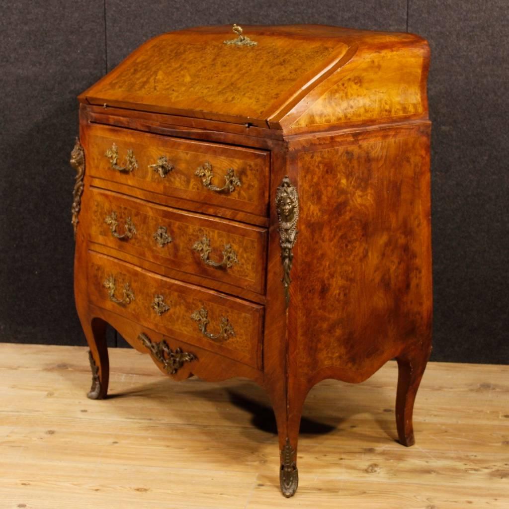 French bureau from early 20th century. Furniture in Louis XV style pleasantly inlaid in wood of elm burl, mahogany, maple and rosewood. Bureau equipped with three external drawers of good capacity. Interior of the fall-front complete with four small