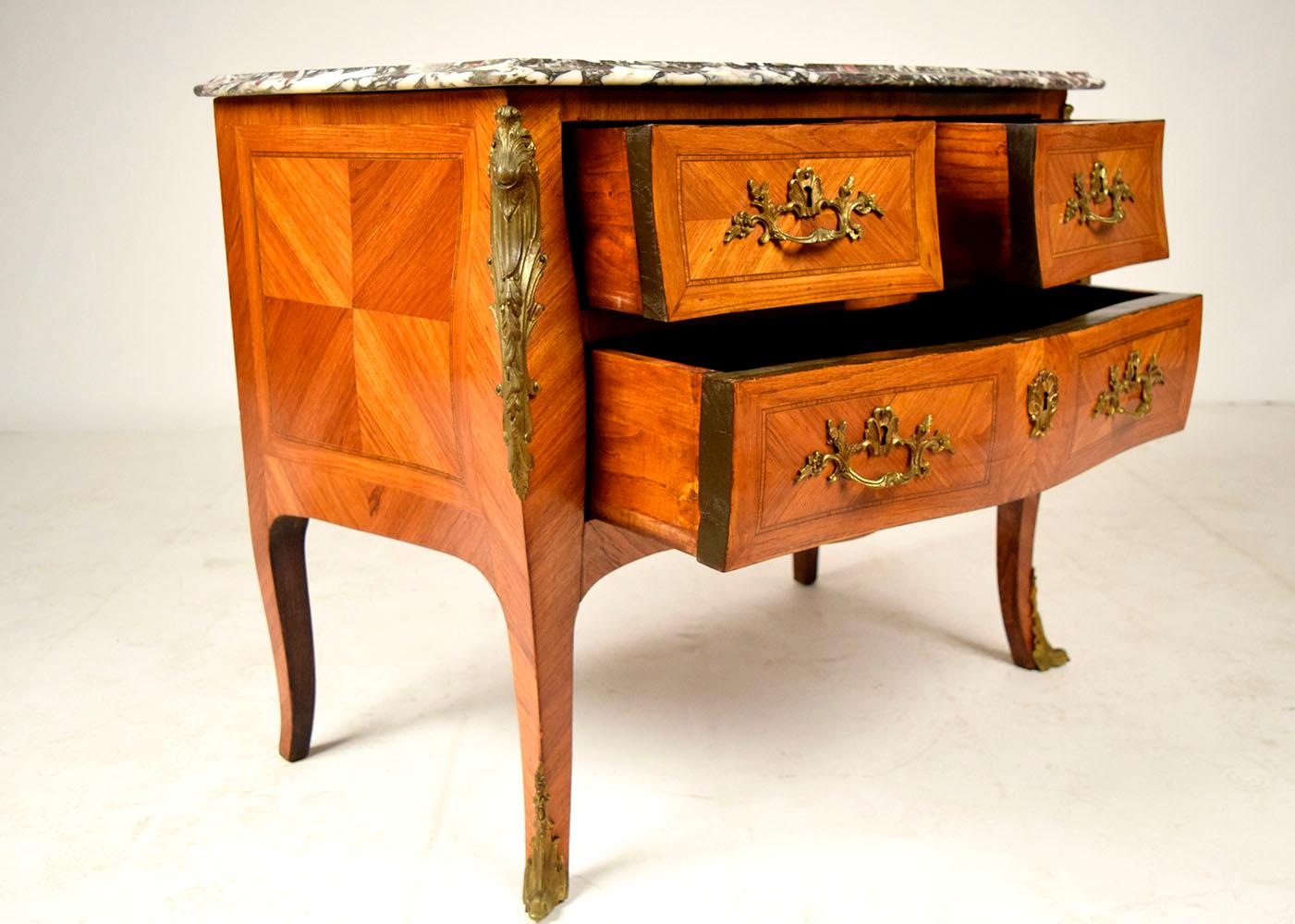 Molded French Louis XV Inlaid Chest of Drawers