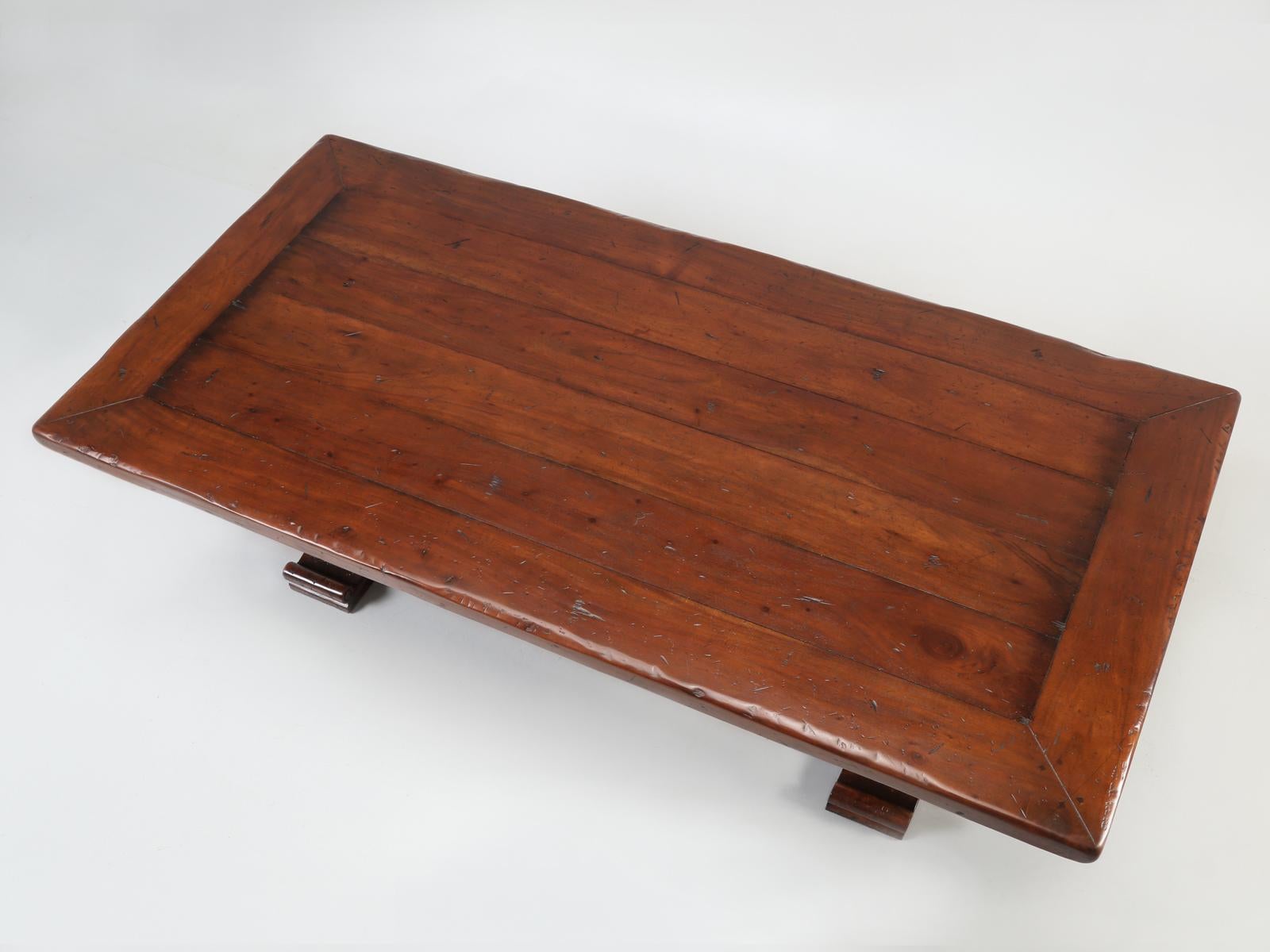 This is well-made imported dining table constructed from solid hardwood, which the manufacturer called walnut, but we have our doubts. What we do know, is that we sold this dining room table about 20-years ago and just repurchased the dining table