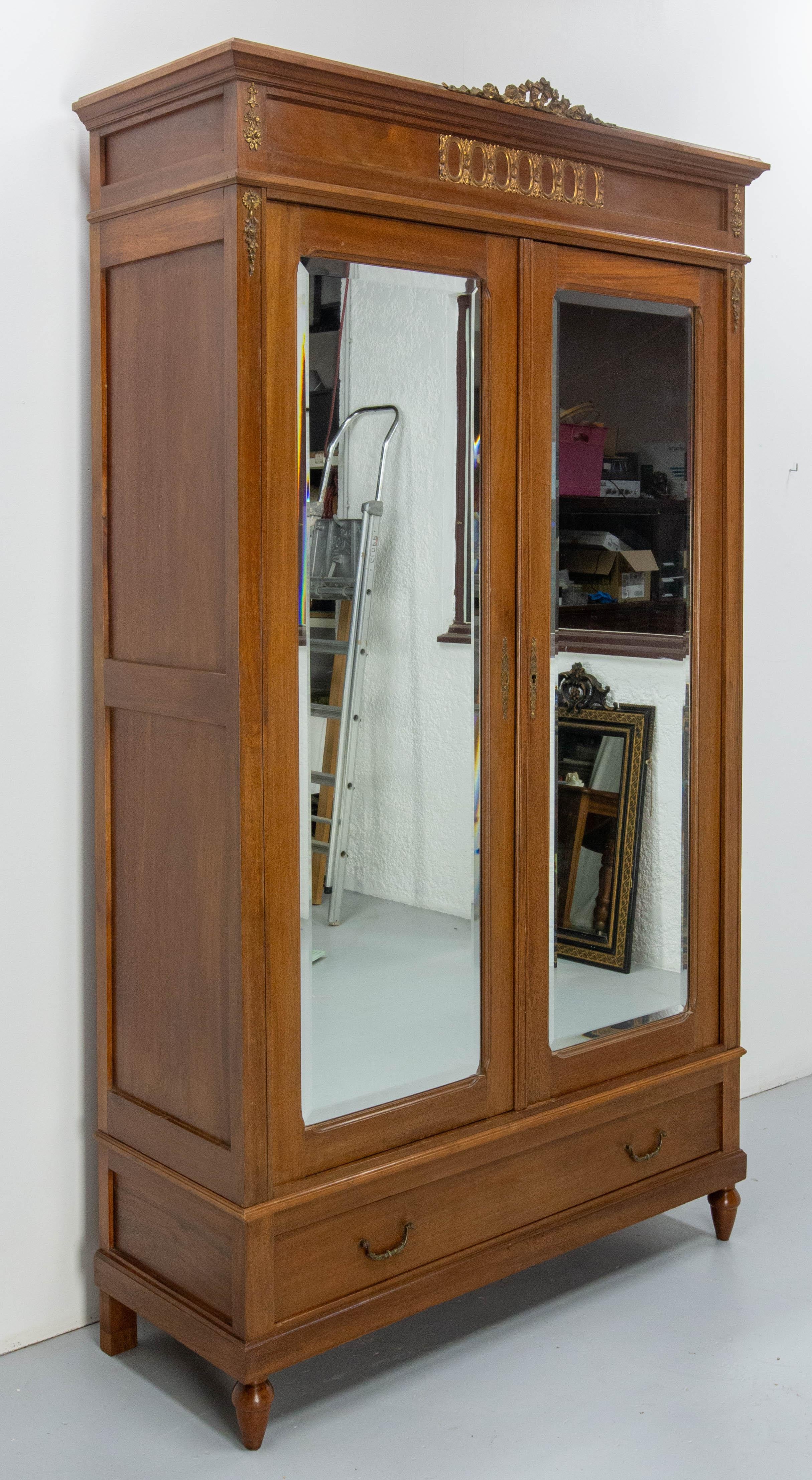 Louis XVI French Iroko Armoire with Beveled Mirrors in the Louis 16 Revival Style, 1900 For Sale