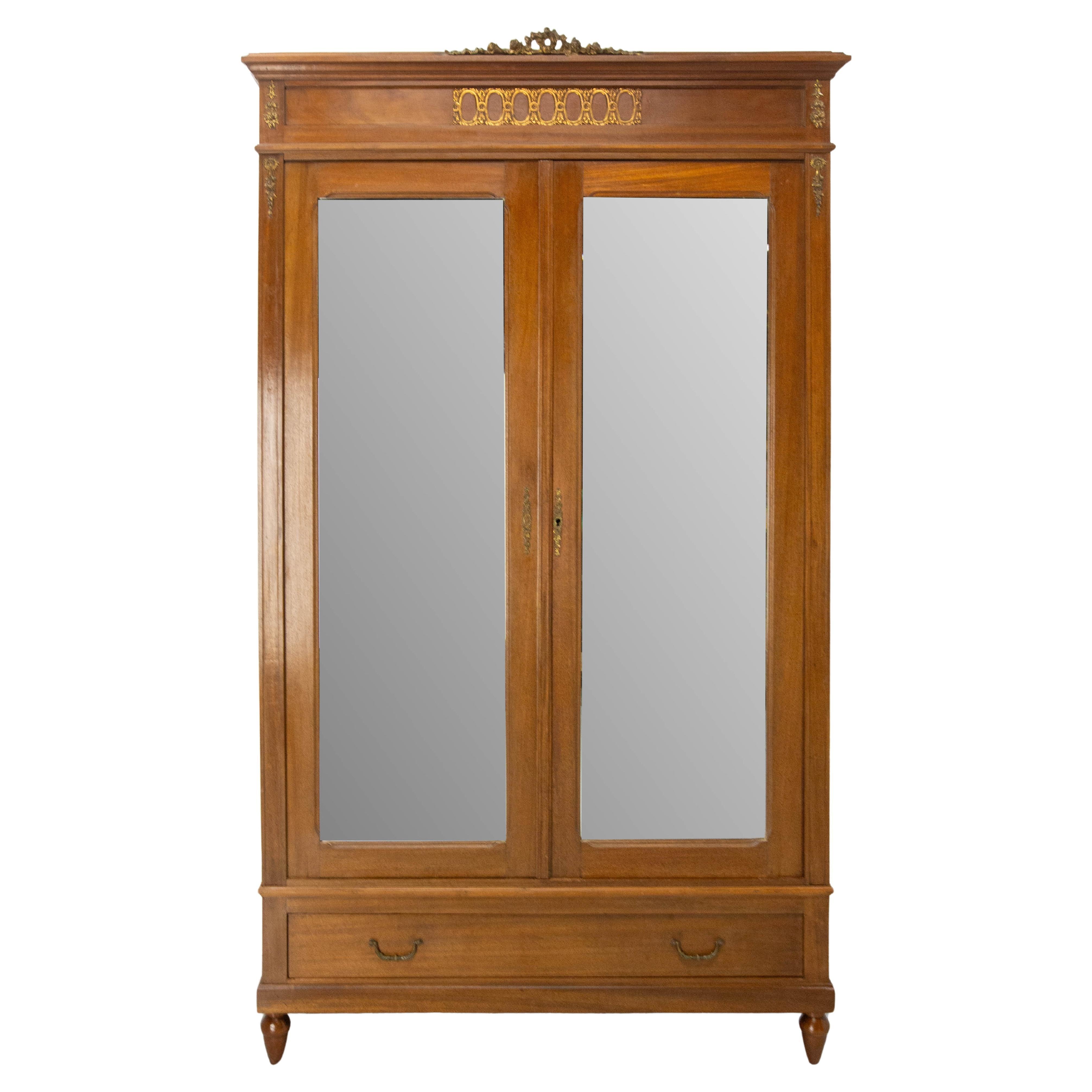 French Iroko Armoire with Beveled Mirrors in the Louis 16 Revival Style, 1900 For Sale