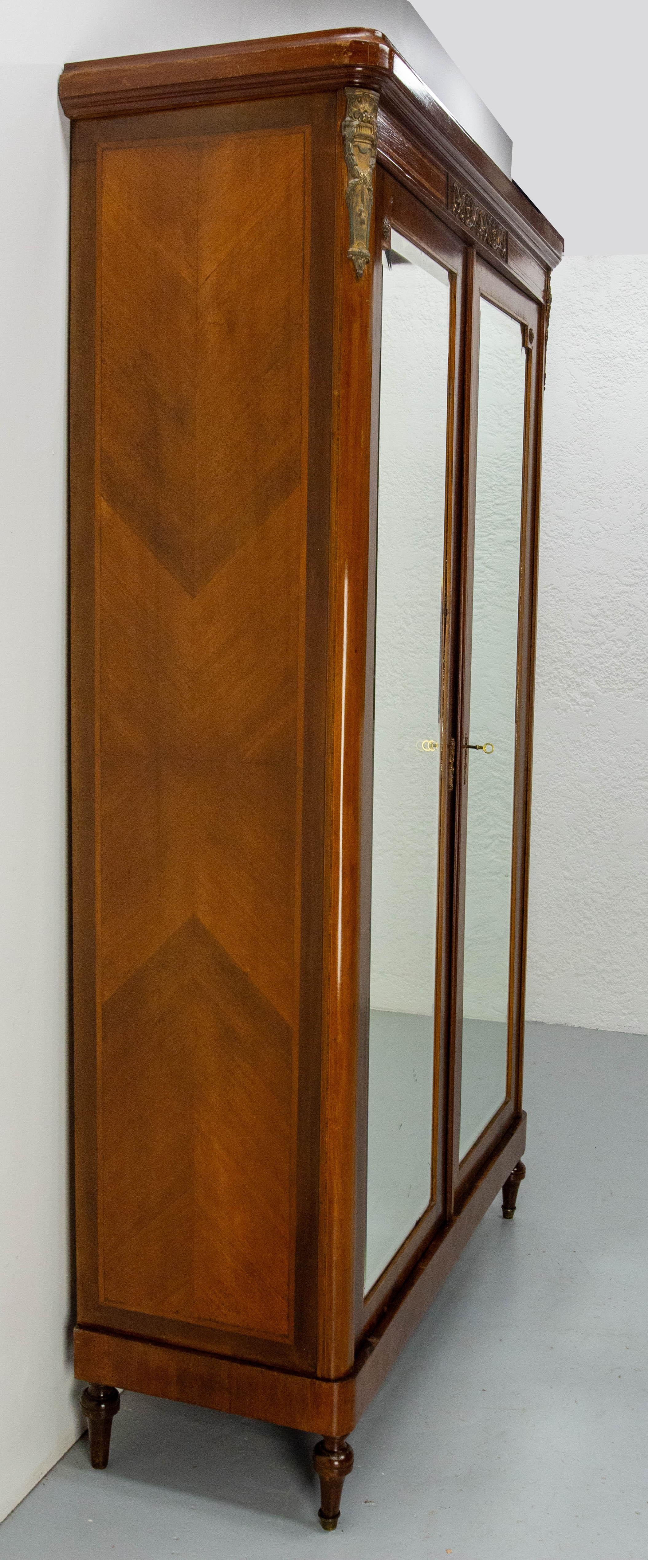 Louis XVI French Iroko & Brass Armoire Beveled Mirrors in the Louis 16 Revival Style, 1900 For Sale