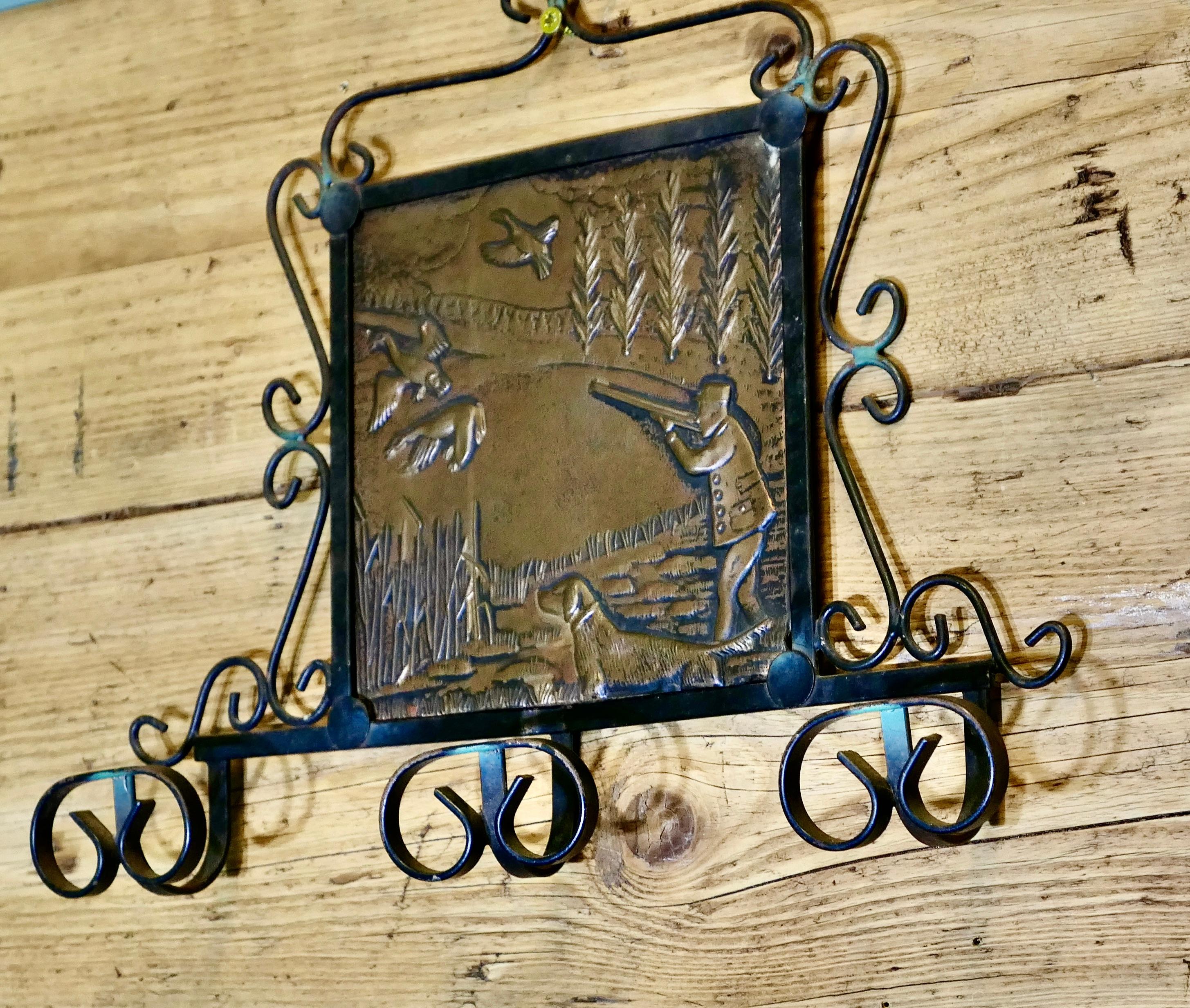French Provincial French Iron and Copper Coat Hooks on a Hunting Theme For Sale