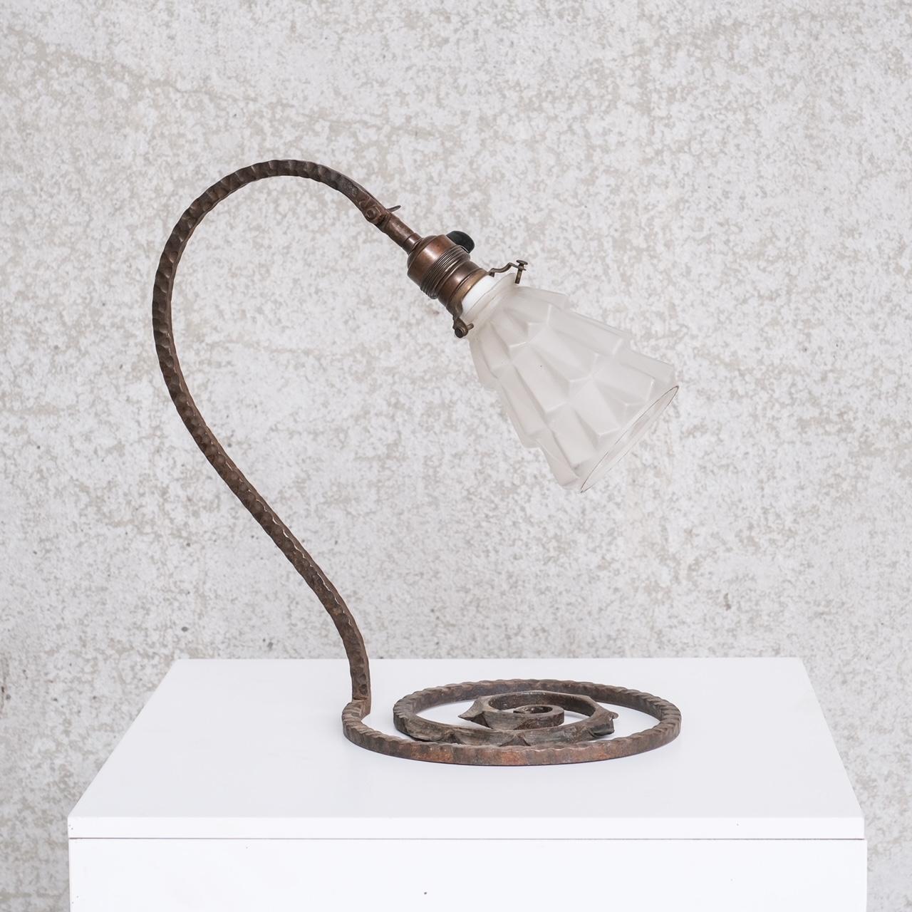 A stylish well formed iron table lamp.

France, c1930s.

With etched glass shade, which adjusts up and down.

Good vintage condition, some scuffs and wear commensurate with age.

Internal ref: 18/10/23/008.

Location: Belgium Gallery.

Dimensions: