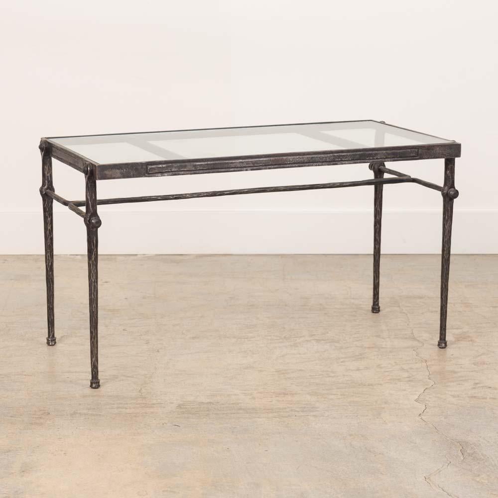 Vintage iron and glass coffee table from France, 1940's. Beautiful iron frame with 4 legs and ball detail. Newly replaced glass top. Original iron finish shows nice age and patina. 
