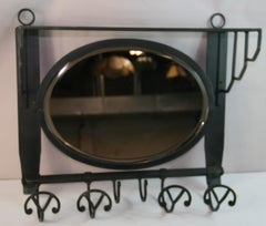 Estantería y perchero de hierro francés y espejo ovalado