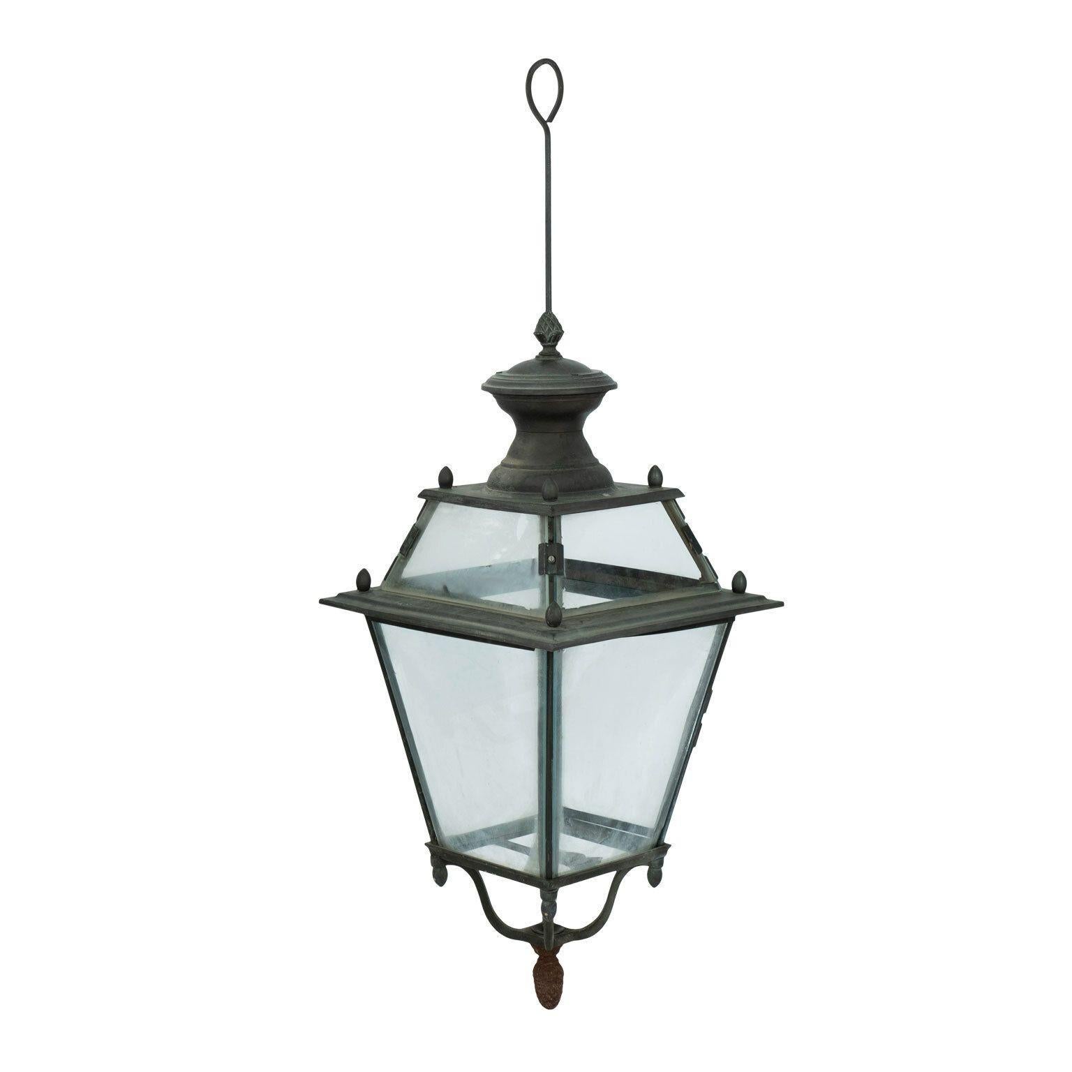 French iron and tole glass-paneled lantern circa 1870-1899. Unwired. Two lanterns are available but sold individually priced $3,800 each (see last image and item ref. 1022).