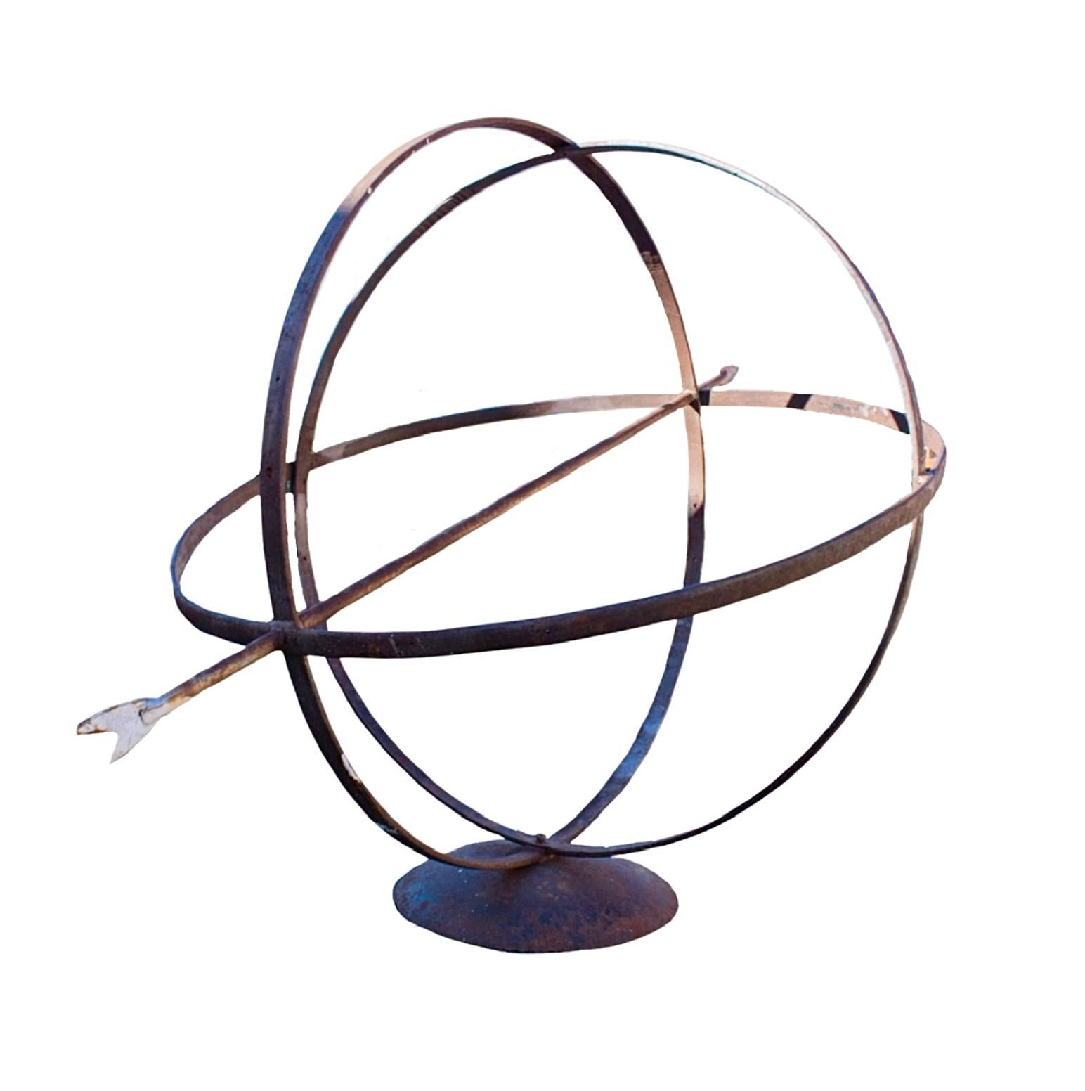 This antique French Iron Armillary, dating back to the 1920s, is a stunning piece of craftsmanship. Made entirely out of iron, it boasts a large size and intricate design. As a decorative and historical piece, it is the perfect addition to any home