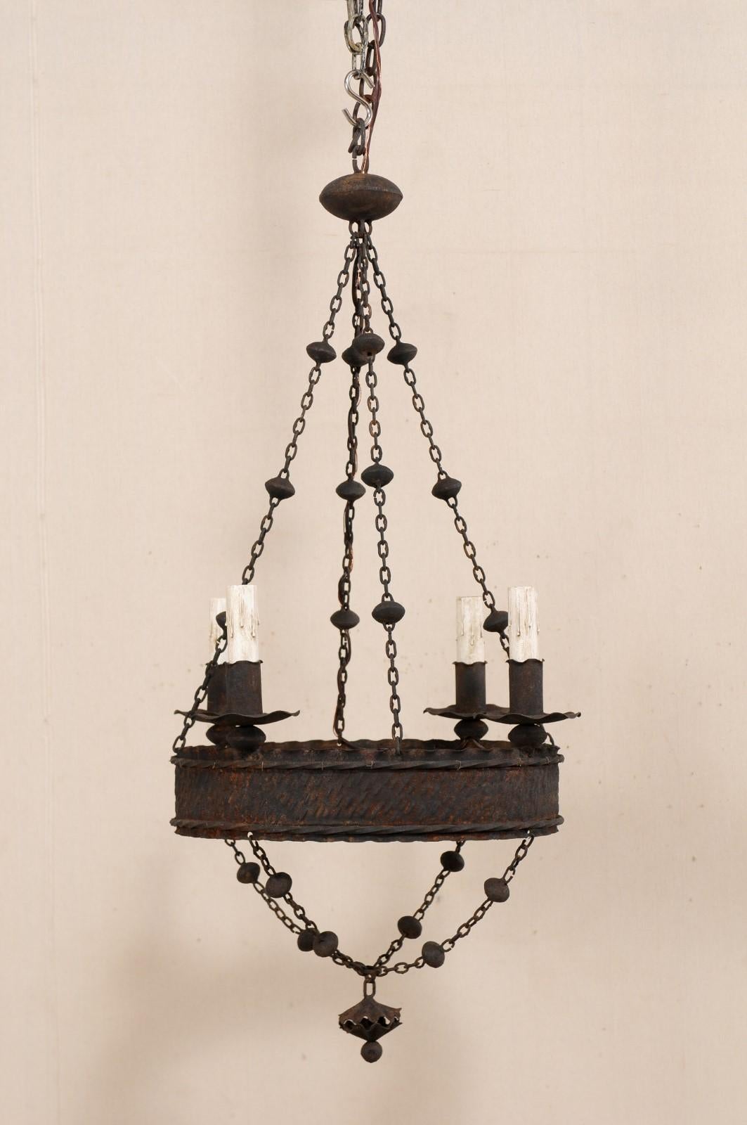 Patinated French Iron Basket-Style Four-Light Chandelier from the Mid-20th Century