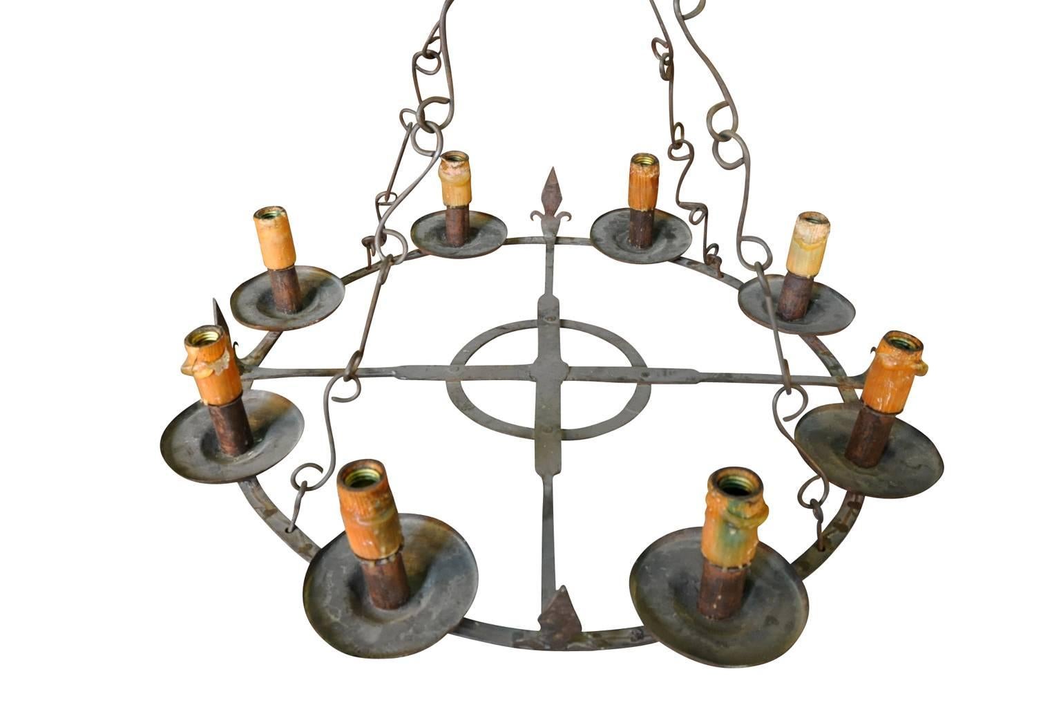 A very handsome late 19th century chandelier, beautifully crafted from iron.
