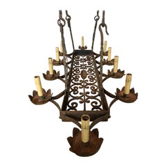 Antique French Iron Chandelier with a Open Scroll Platform and 8 arms