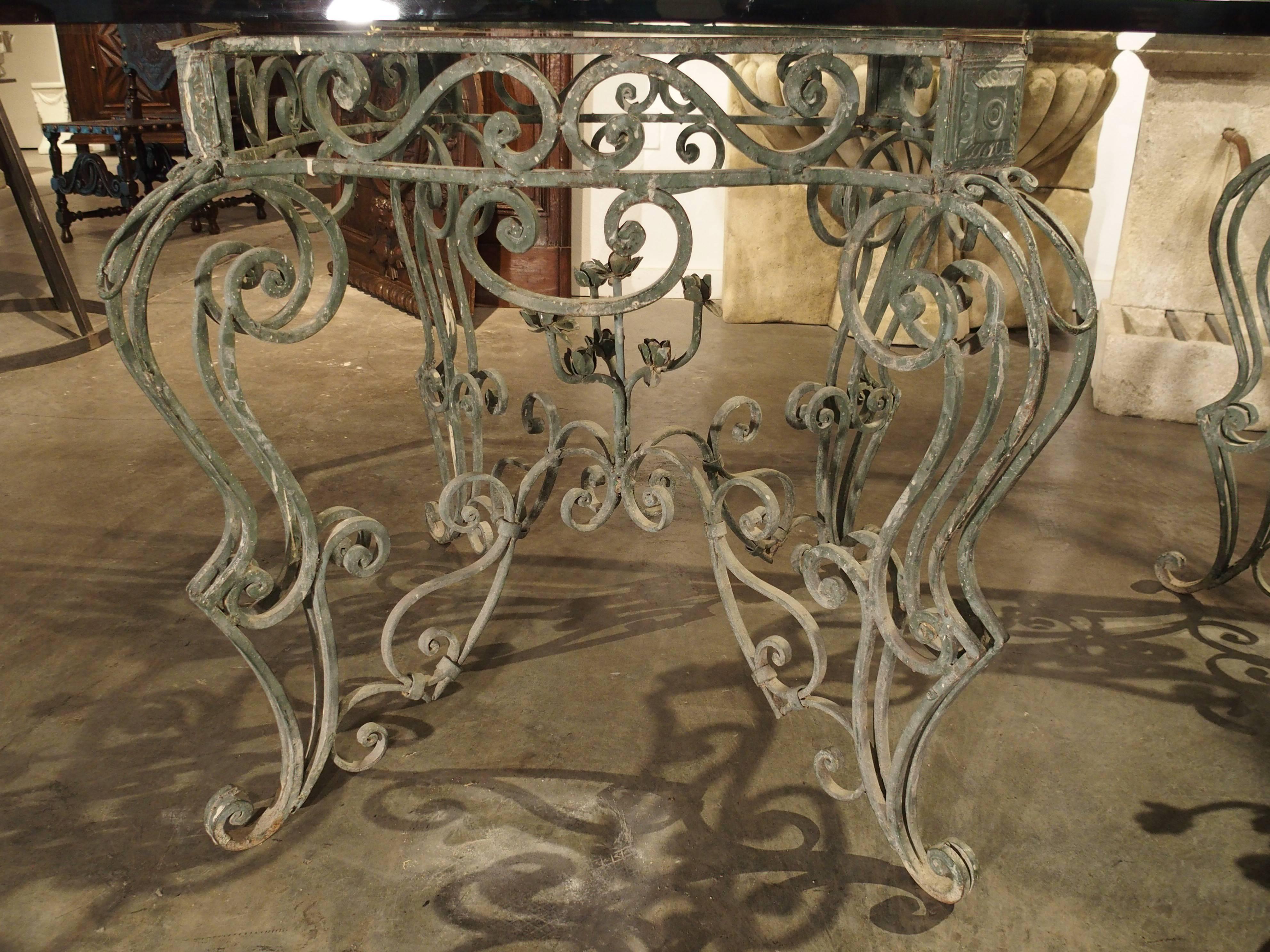 glass top wrought iron dining table