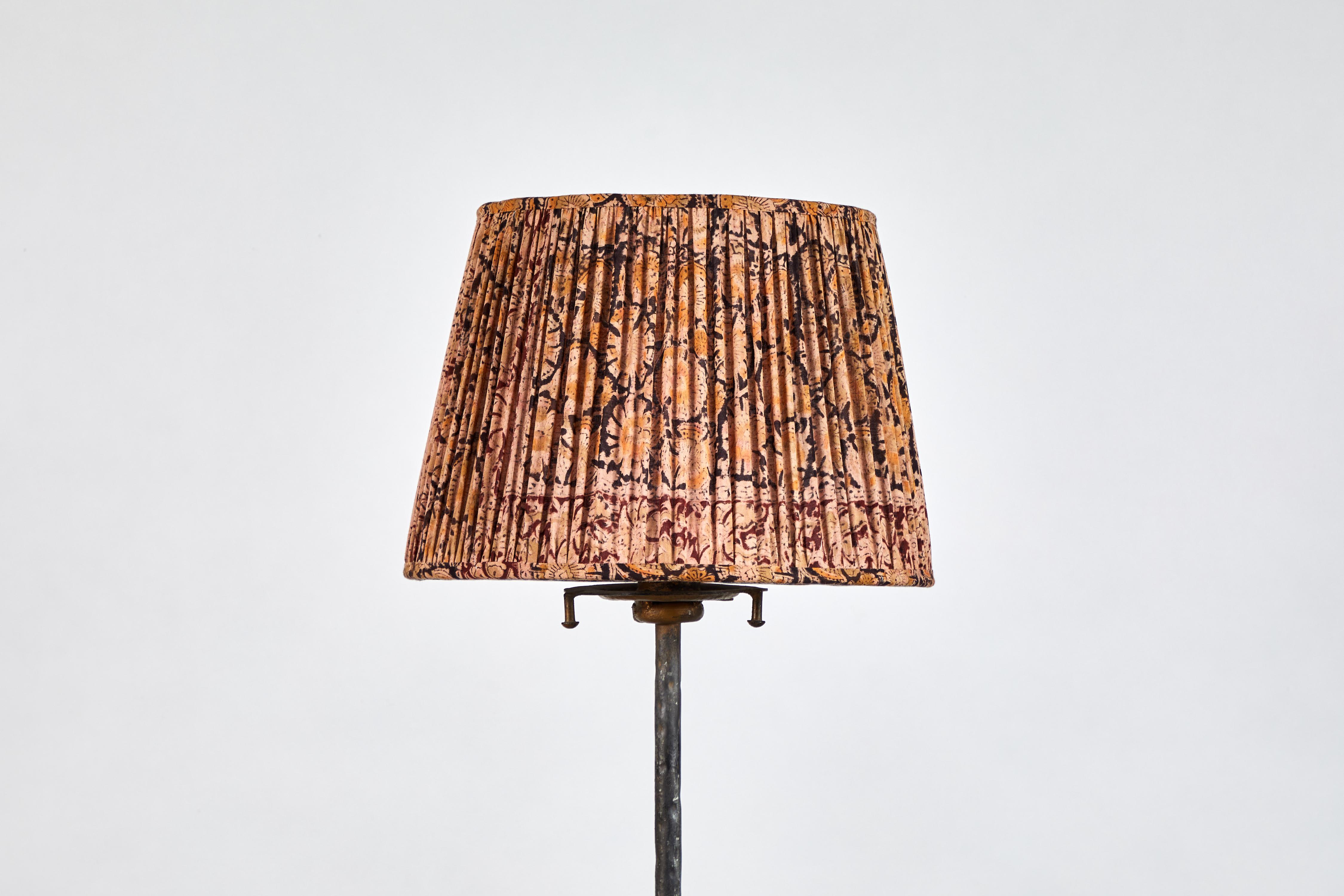 French hand forged iron floor lamp with custom floral shirred lampshade with shades of black, rust and yellow.