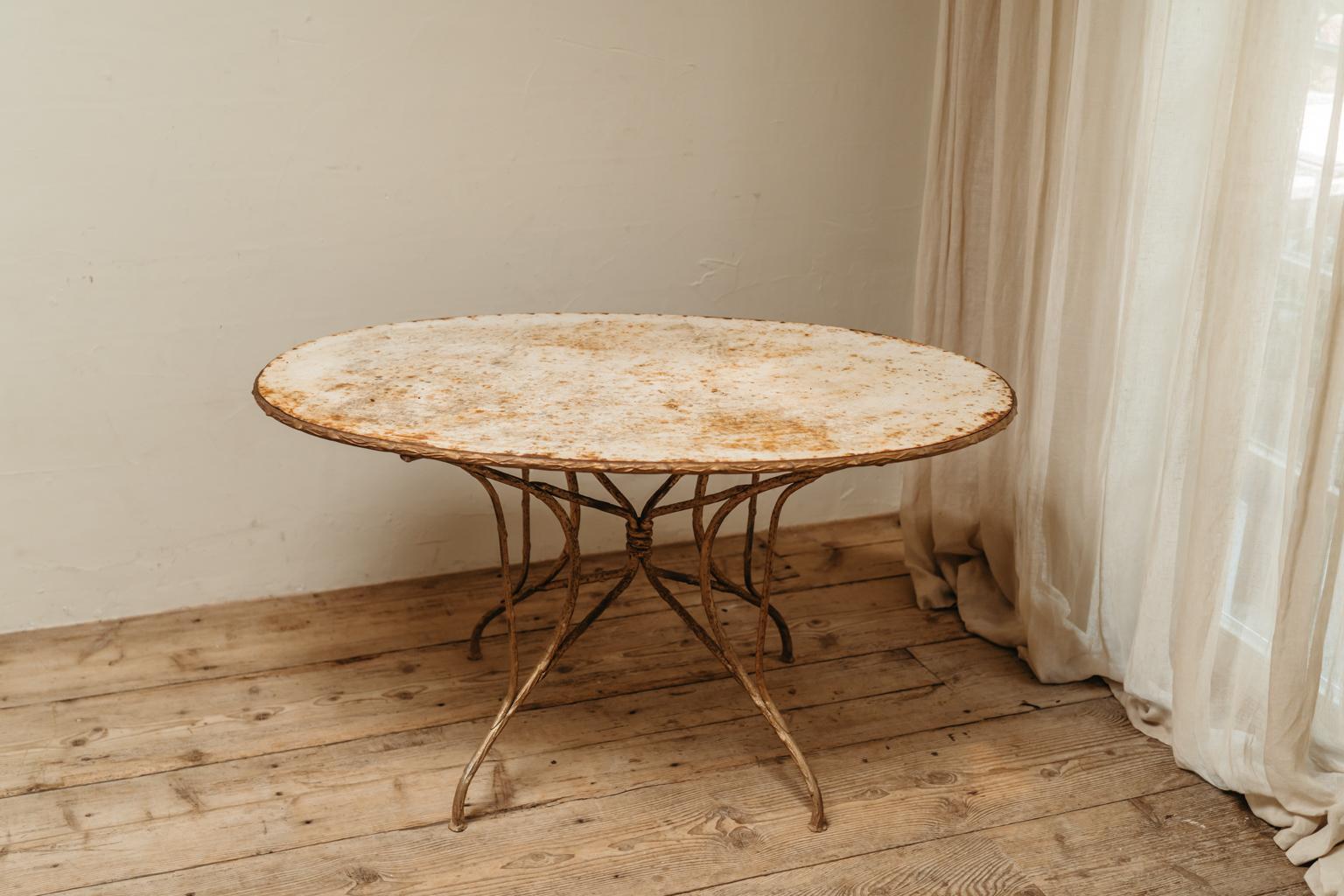 great patina on this very elegant french garden table ... unusual model ... 