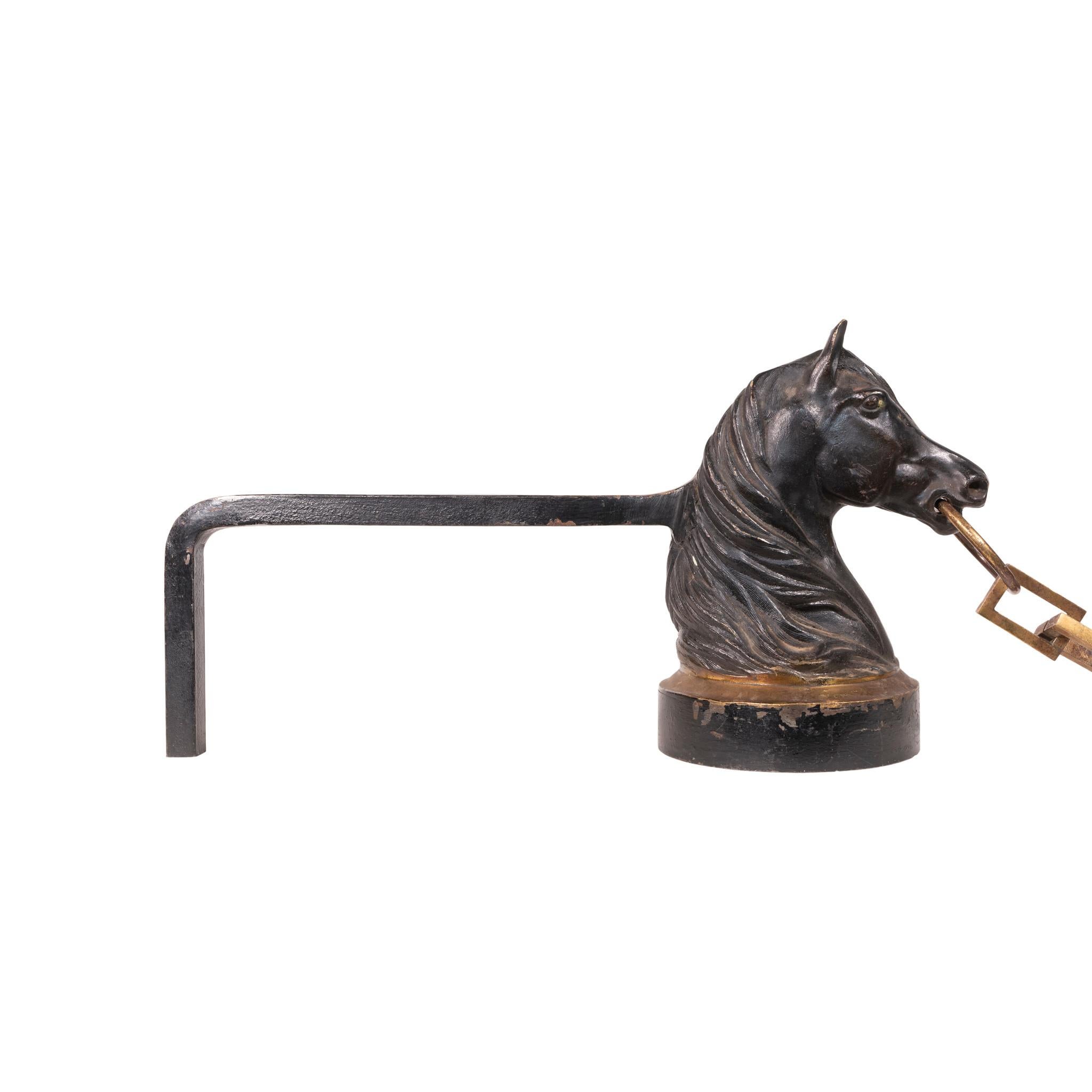 Set of early 20th century French iron and bronze chenets (andirons) with horse heads. 

Period: First quarter 20th century
Origin: France
Size: 8