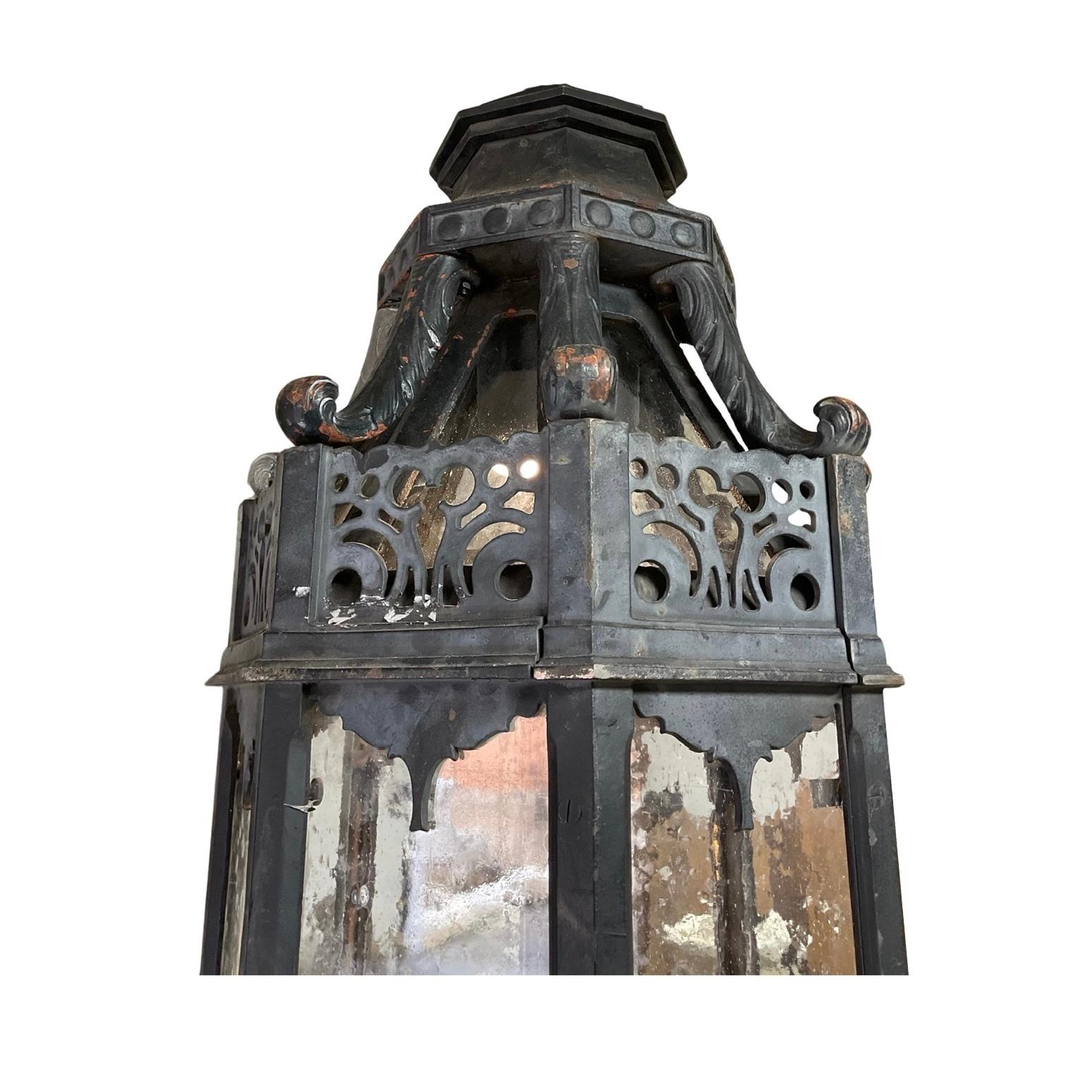 Crafted in France during the 1930s, this large iron lantern is the perfect addition to any space, wired and ready to be lit. Experience the timeless elegance and durability of this classic piece, perfect for adding a touch of French charm to your