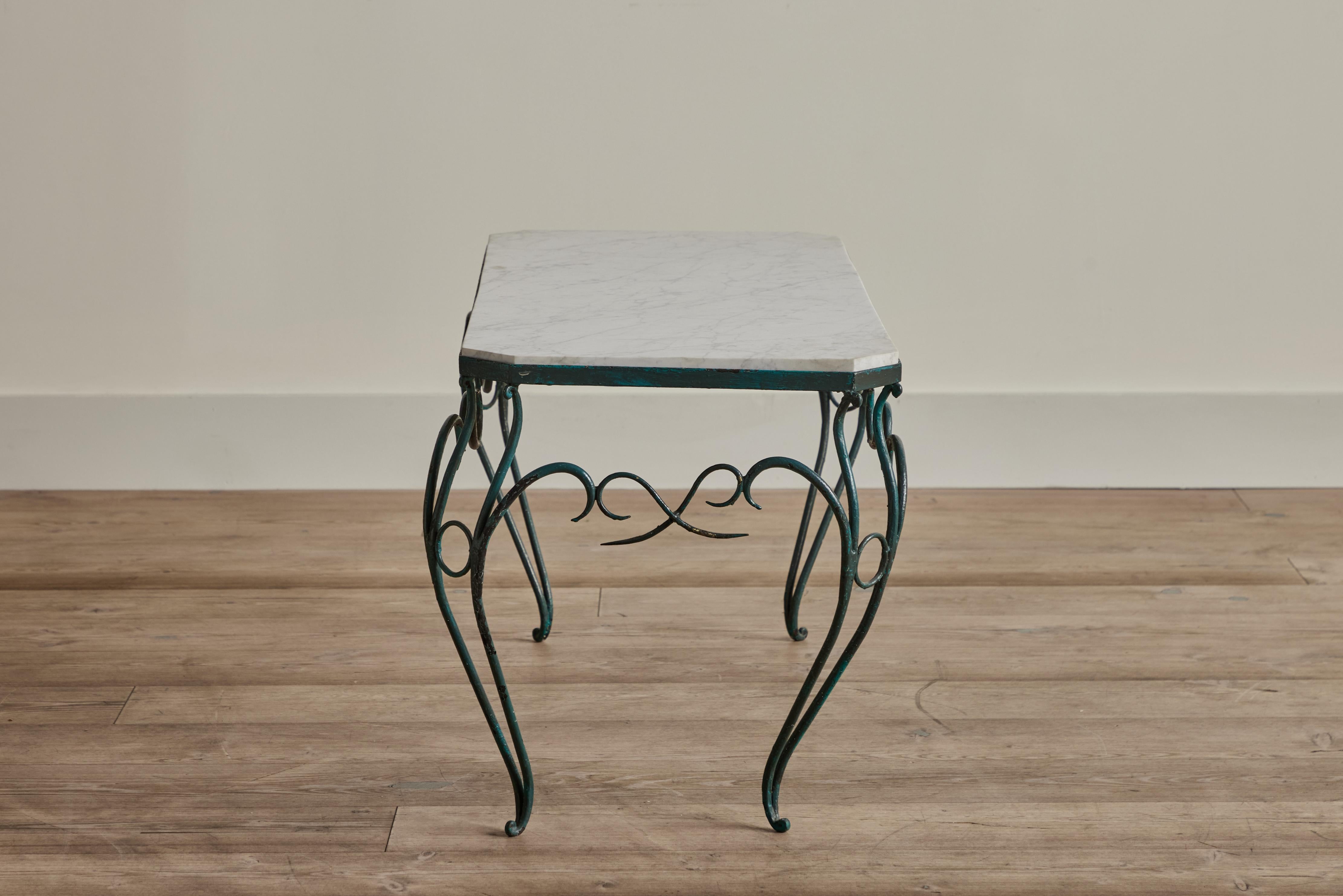 Green iron metal console table with a Carrara marble tabletop from France circa 1950. Some visible wear on metal table base that is consistent with age and use. Marble top is new. 