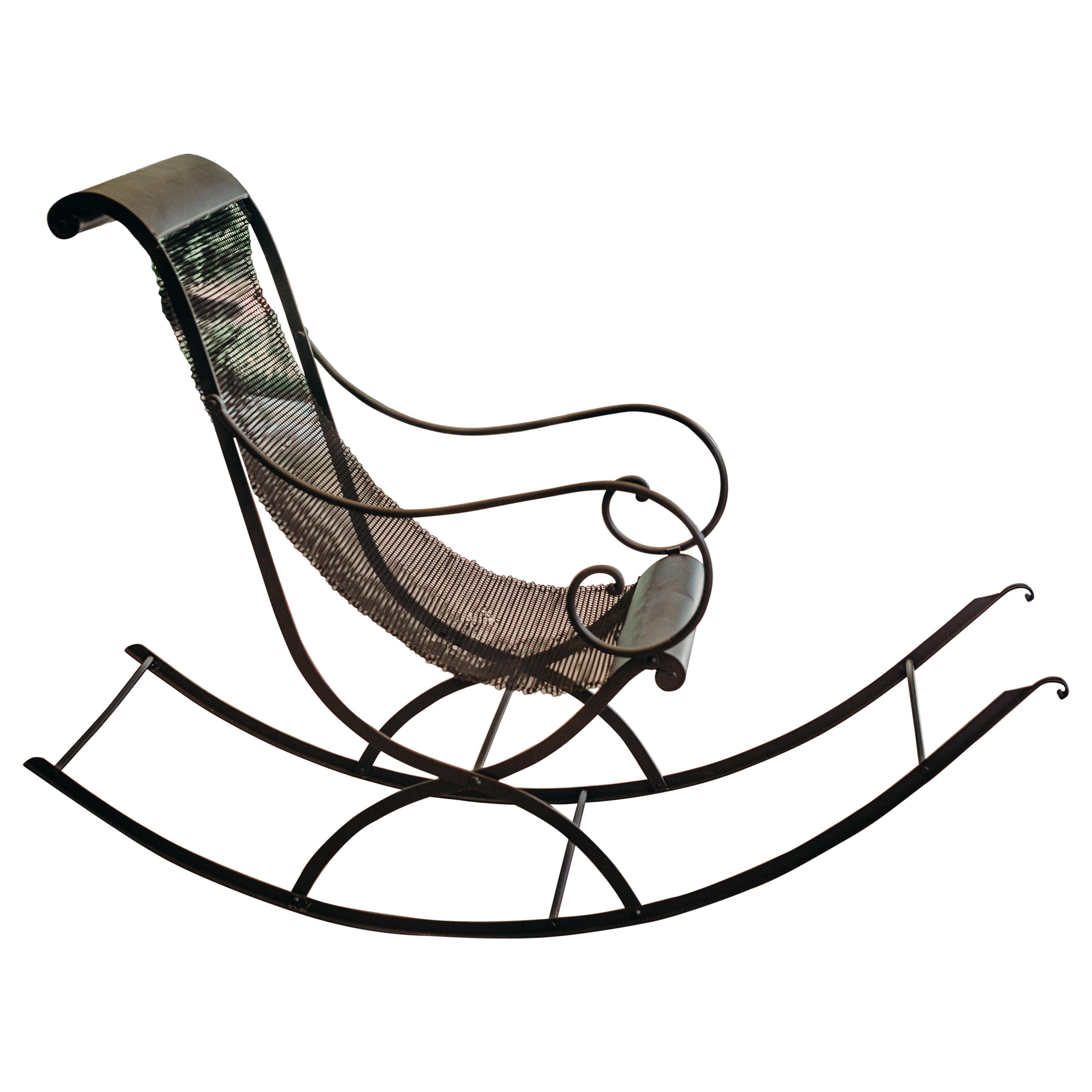 French Iron Rocking Chair with Mesh Sling Seat and Scroll Arms For Sale