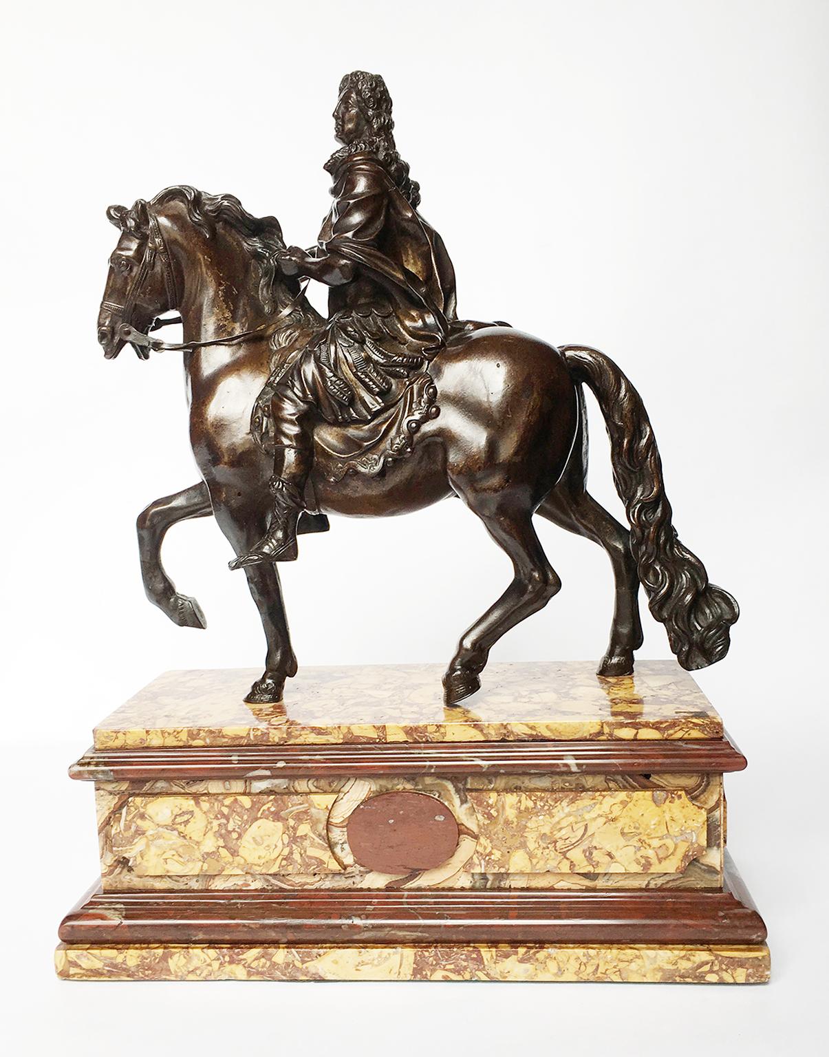 Sculpture of Louis XIV on horseback as Roman emperor
Patinated cast iron (galvanoplastic)
From the model of Martin Van Den Bogaert, called “Desjardins” (1640-1694)
France, last quarter of the 19th century
Base of Rosso Francia and Broccatello di