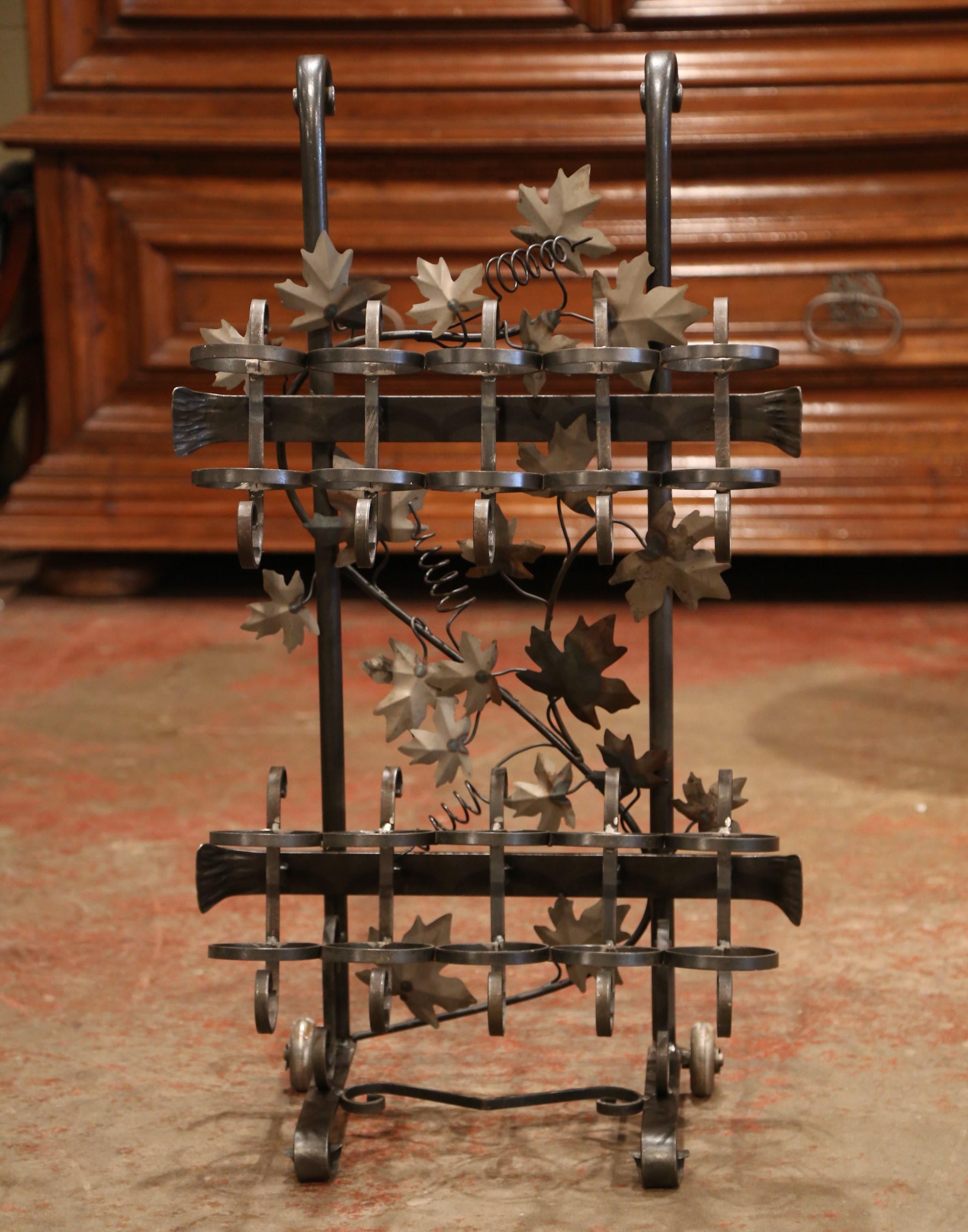 Place this French iron bottle holder in your wine cellar or wet bar to keep your space both organized and beautiful. Crafted in the Rhone region of France circa 2000, the cart is forged of iron and is decorated with metal vine leaves. The rack with