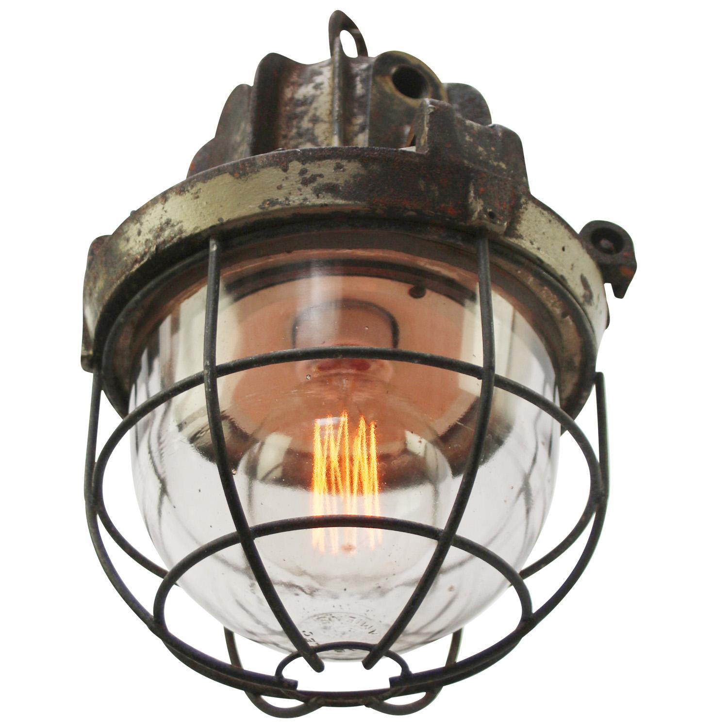 French industrial hanging lamp by Mapelec Amiens. 1958
Beige brown cast iron with clear glass

Heavy!

Weight: 14.00 kg / 30.9 lb

Priced per individual item. All lamps have been made suitable by international standards for incandescent light bulbs,