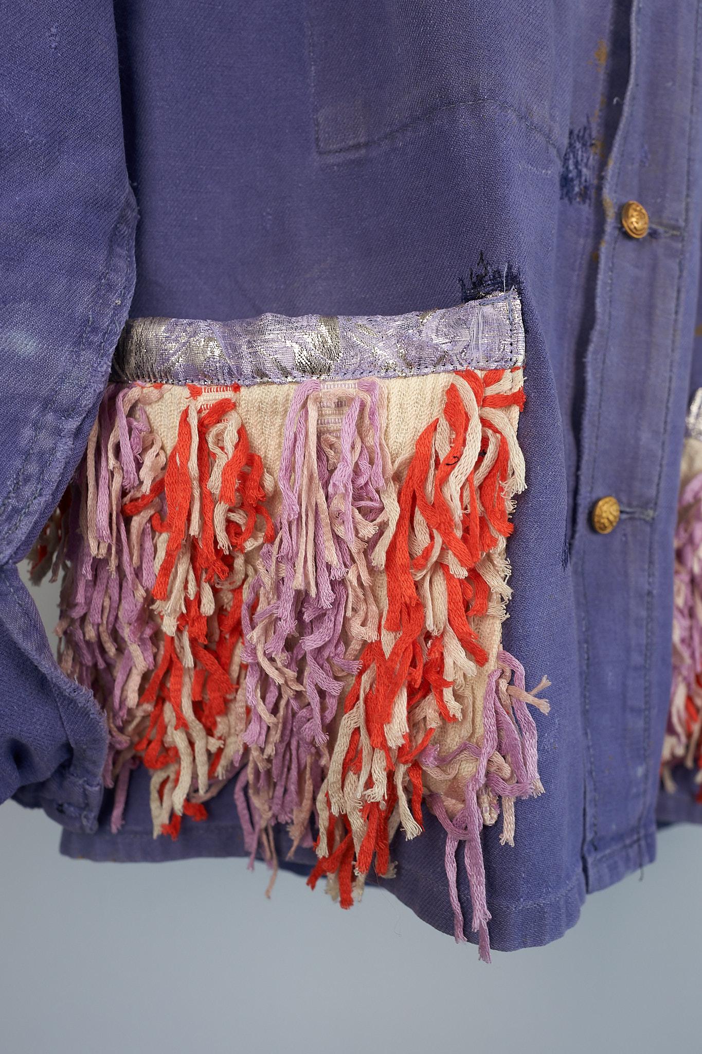 French Distressed Blue Lavender Tone Work Wear Jacket with Fringe Pockets in Orange and Lilac, Lilac Brocade and Gold Brass Chain, Lilac Tweed Lurex Collar

Brand: J Dauphin
Size: Medium 
100% Sustainable Luxury, Up-cycled and Re-purposed