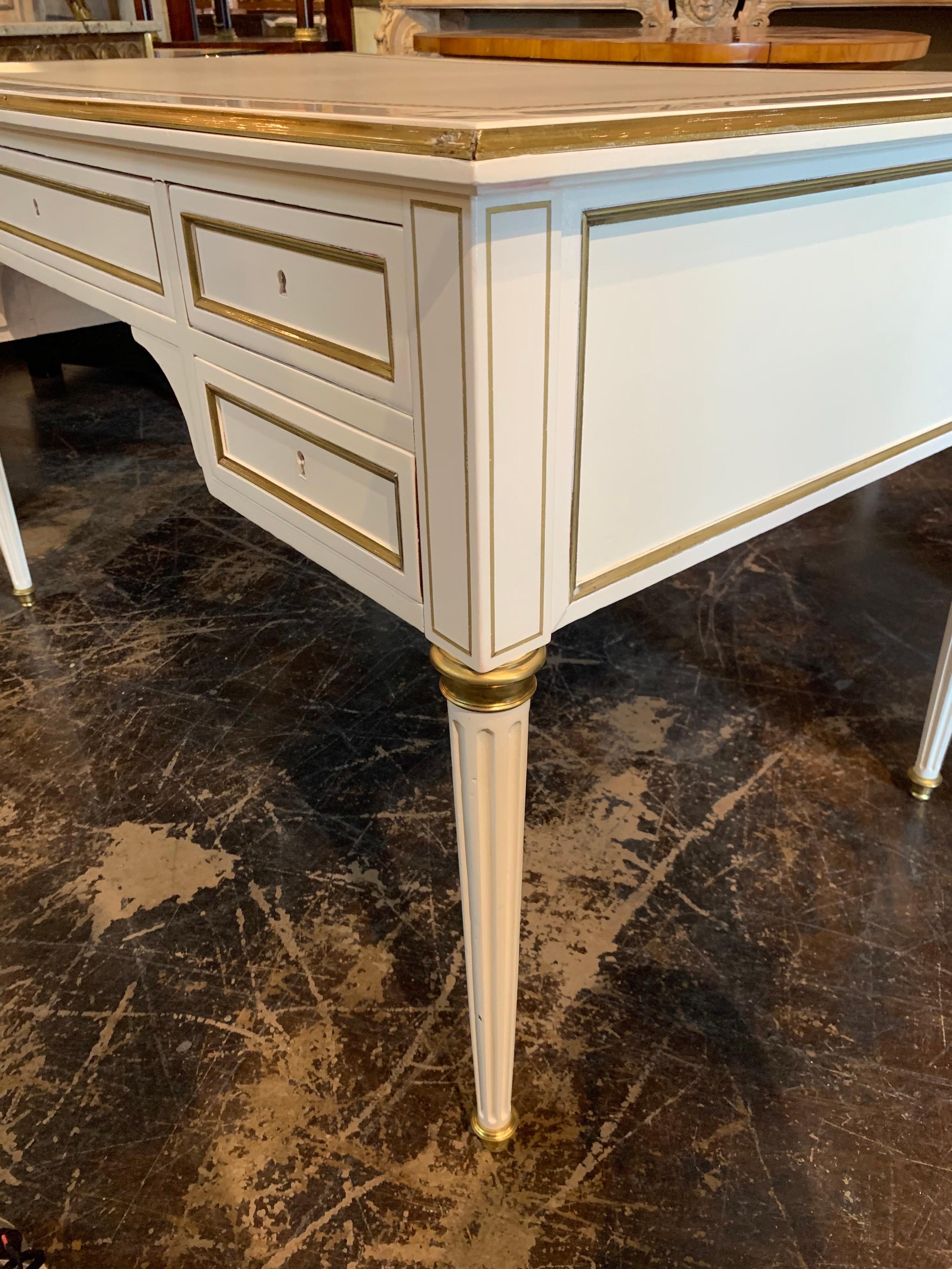 20th Century French Jansen Style White Lacquered and Brass Trim Desk with a Leather Top
